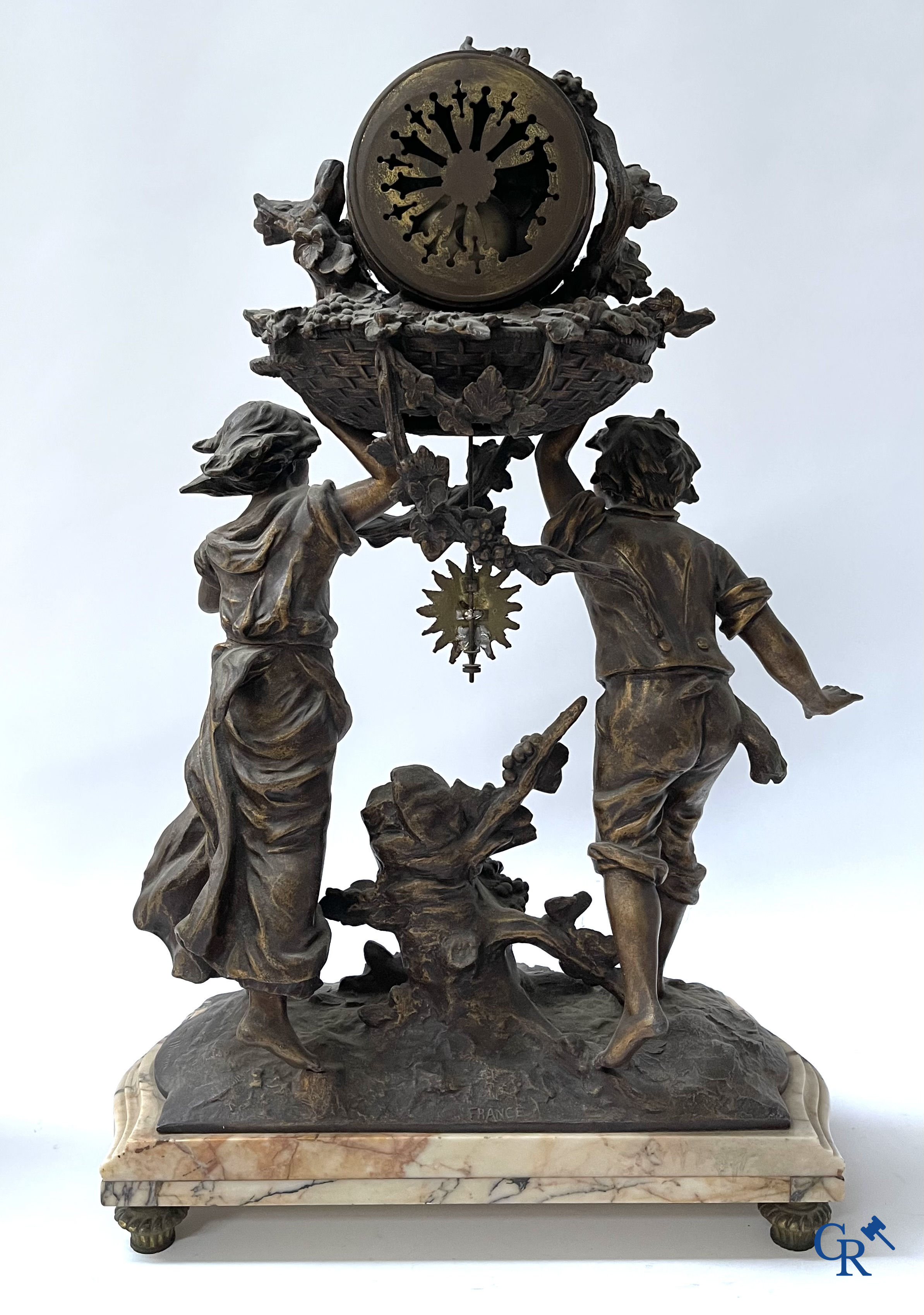 Louis & François Moreau (after). A large 3-piece fireplace set in spelter and marble. Circa 1910.