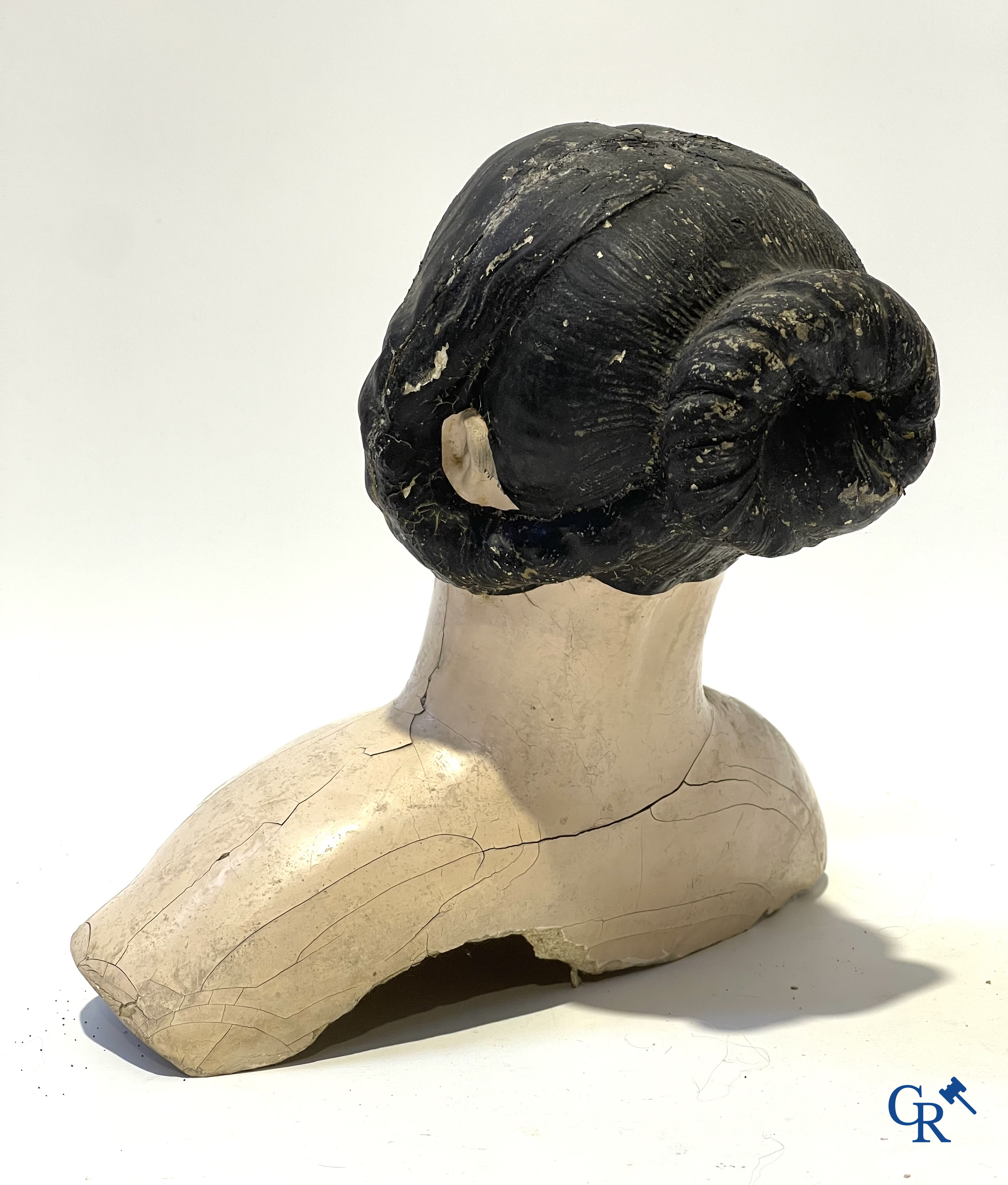 Old toys, an antique doll with porcelain head marked Armand Marseille and a bust in papier-mâché.