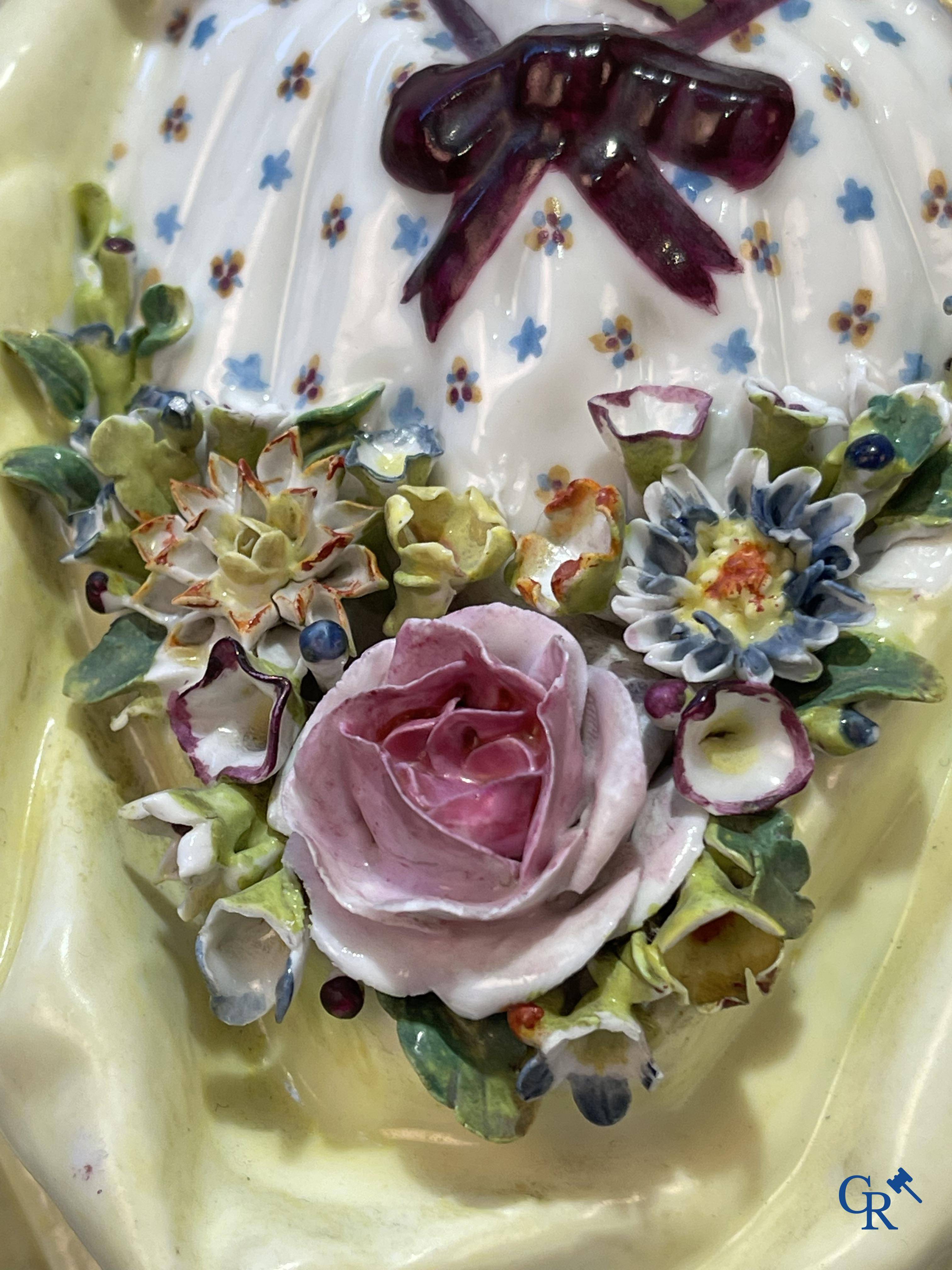 European porcelain, Meissen, a couple in finely polychromed German porcelain. Marked with the swords.