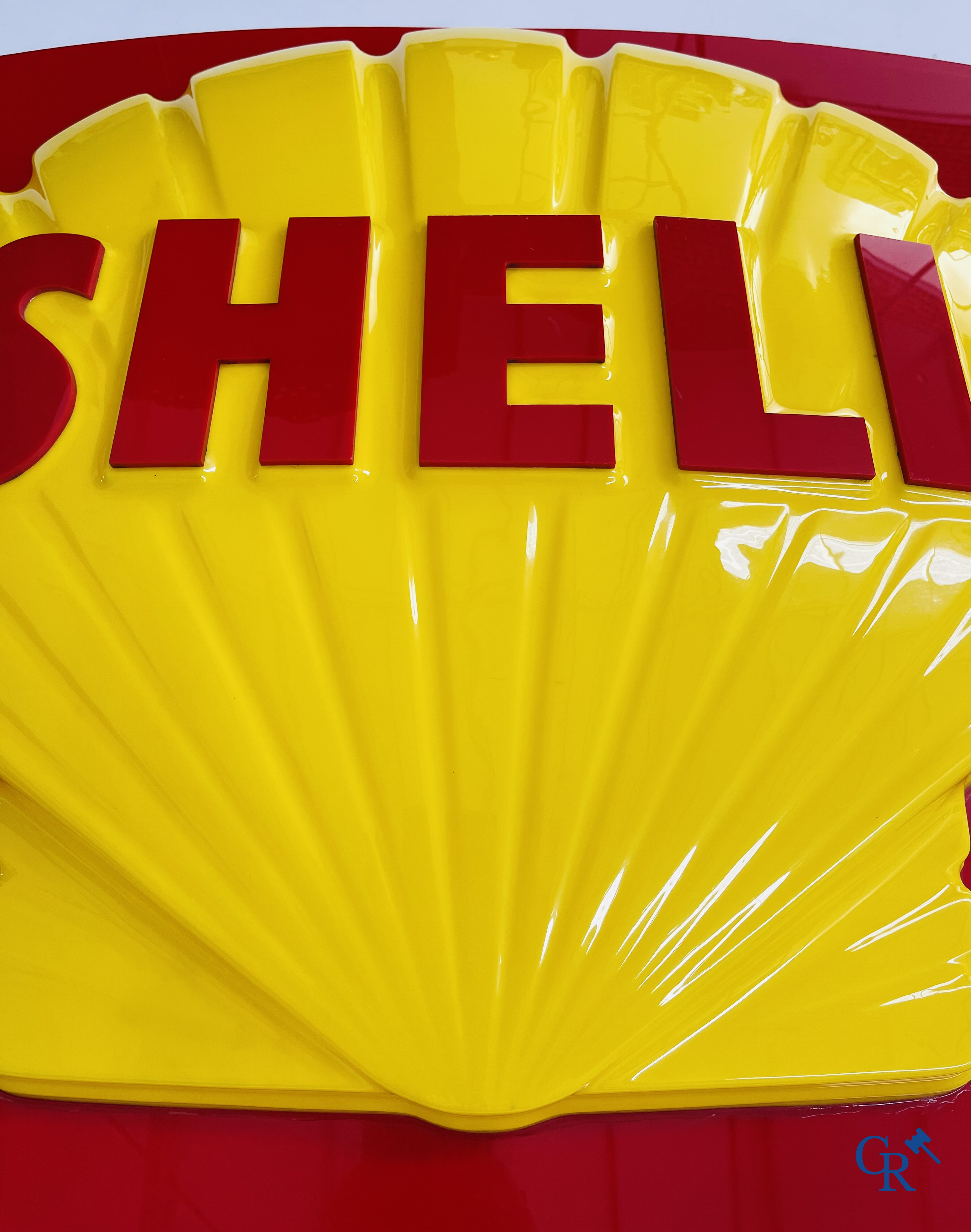 Shell, large representation of the red-yellow Shell shell in bombed plexiglass.