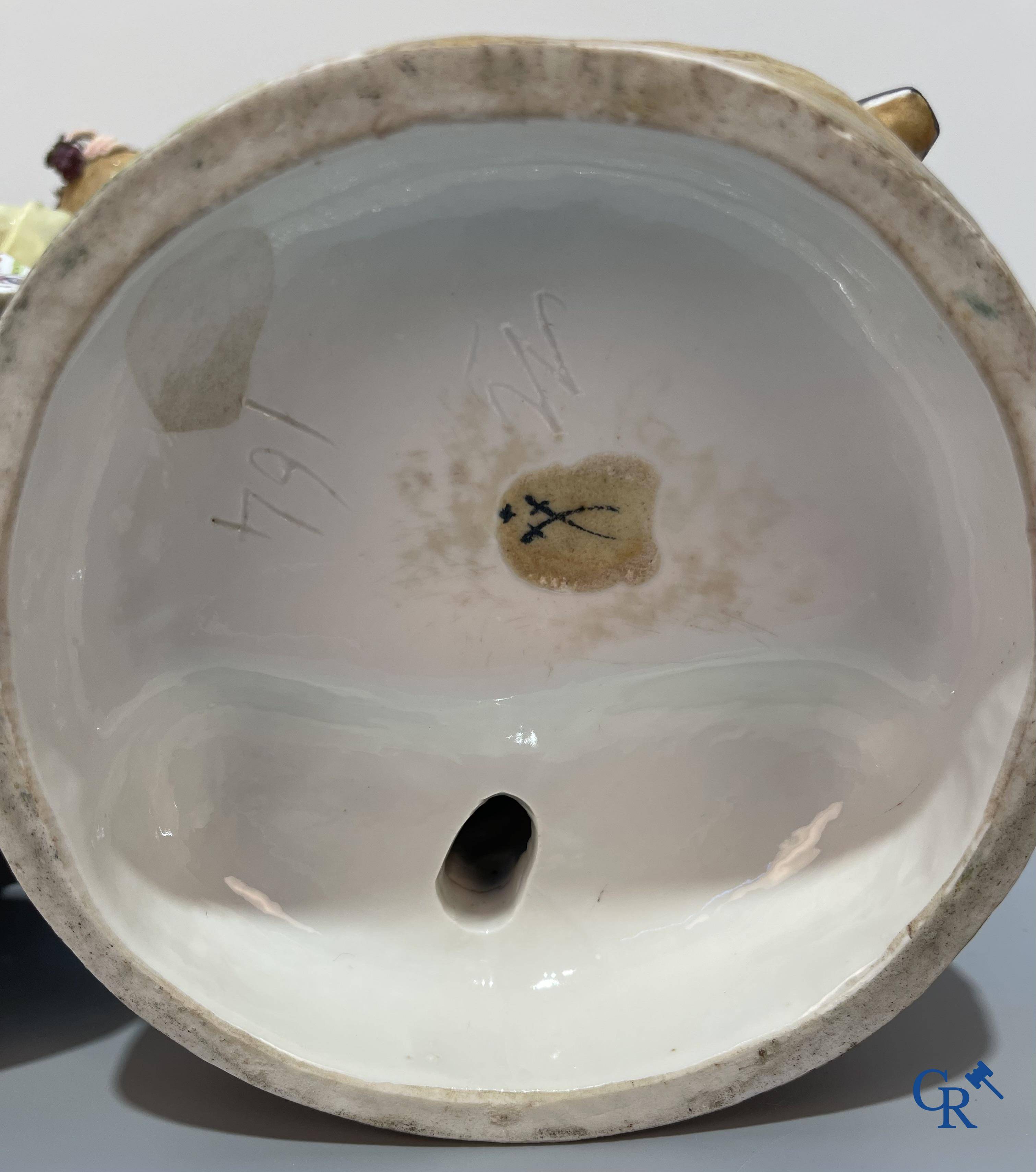 European porcelain, Meissen, a couple in finely polychromed German porcelain. Marked with the swords.