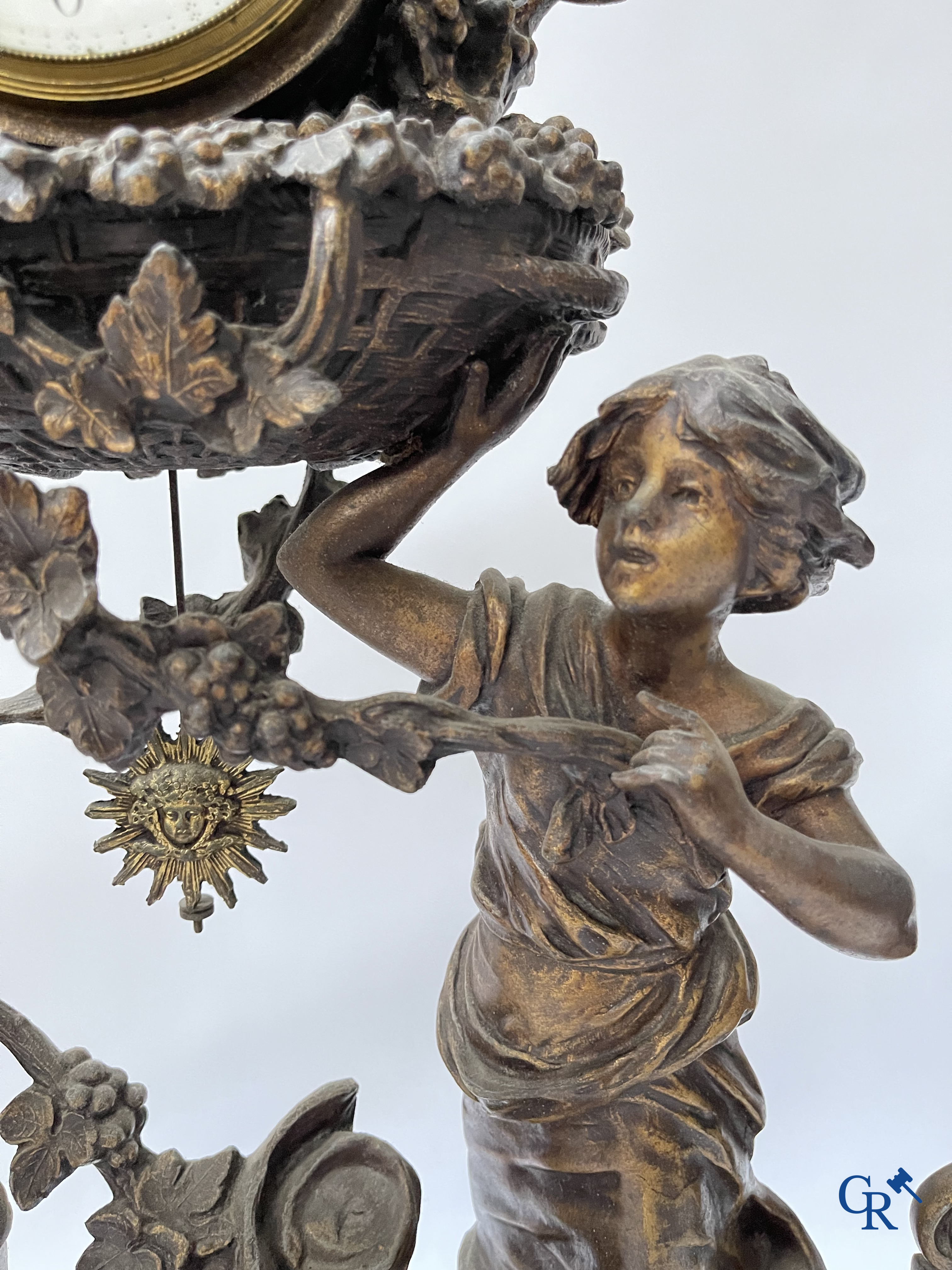 Louis & François Moreau (after). A large 3-piece fireplace set in spelter and marble. Circa 1910.