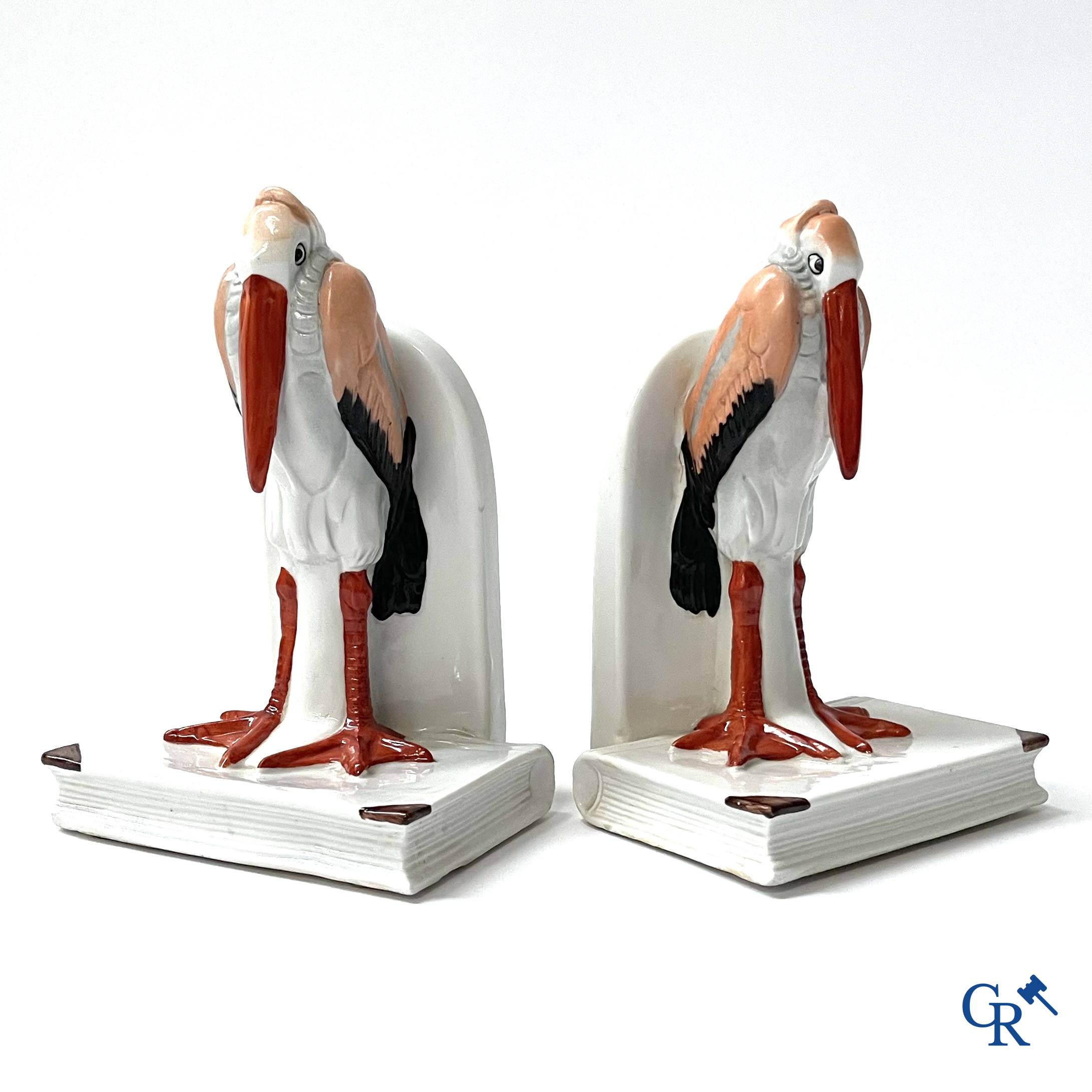 Art Deco, a pair of bookends in polychrome porcelain with a typical Art Deco representation of marabou.