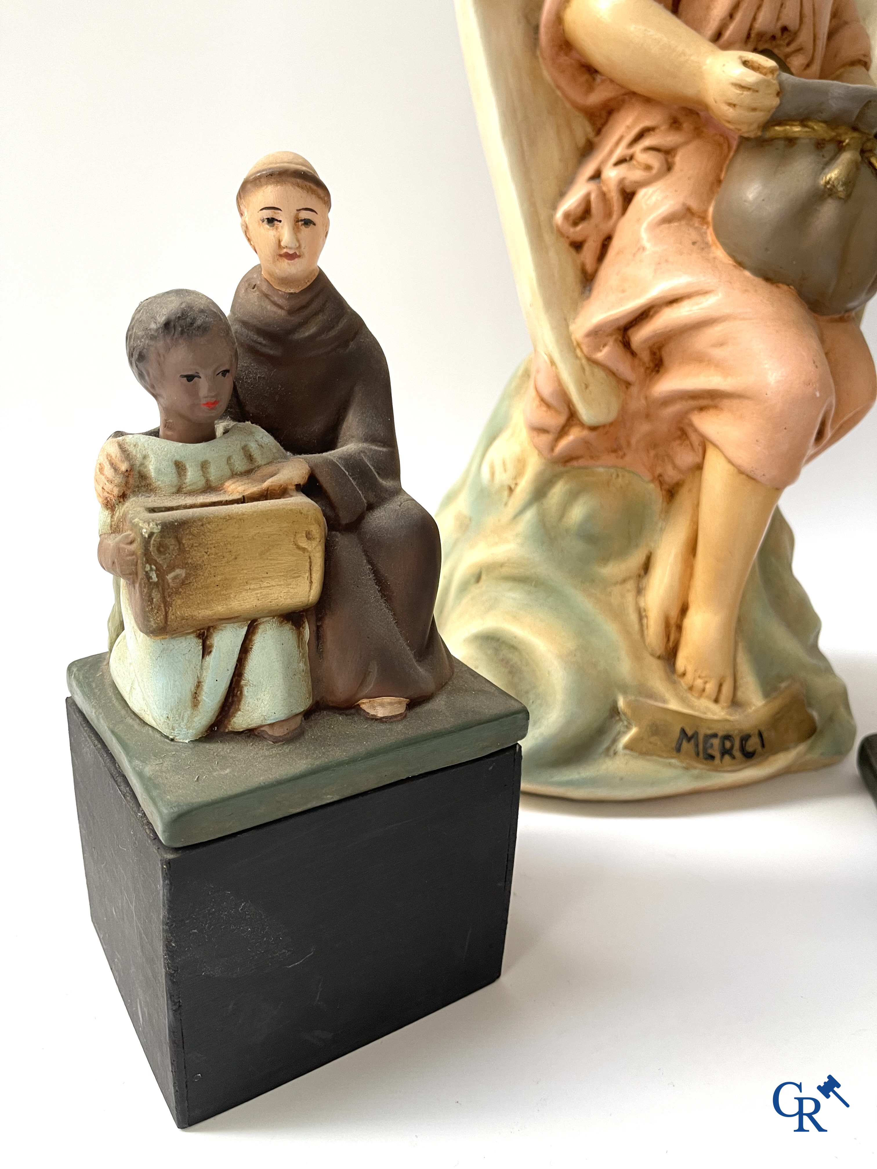 3 plaster piggy banks with nodding heads for the benefit of the Holy Missions.