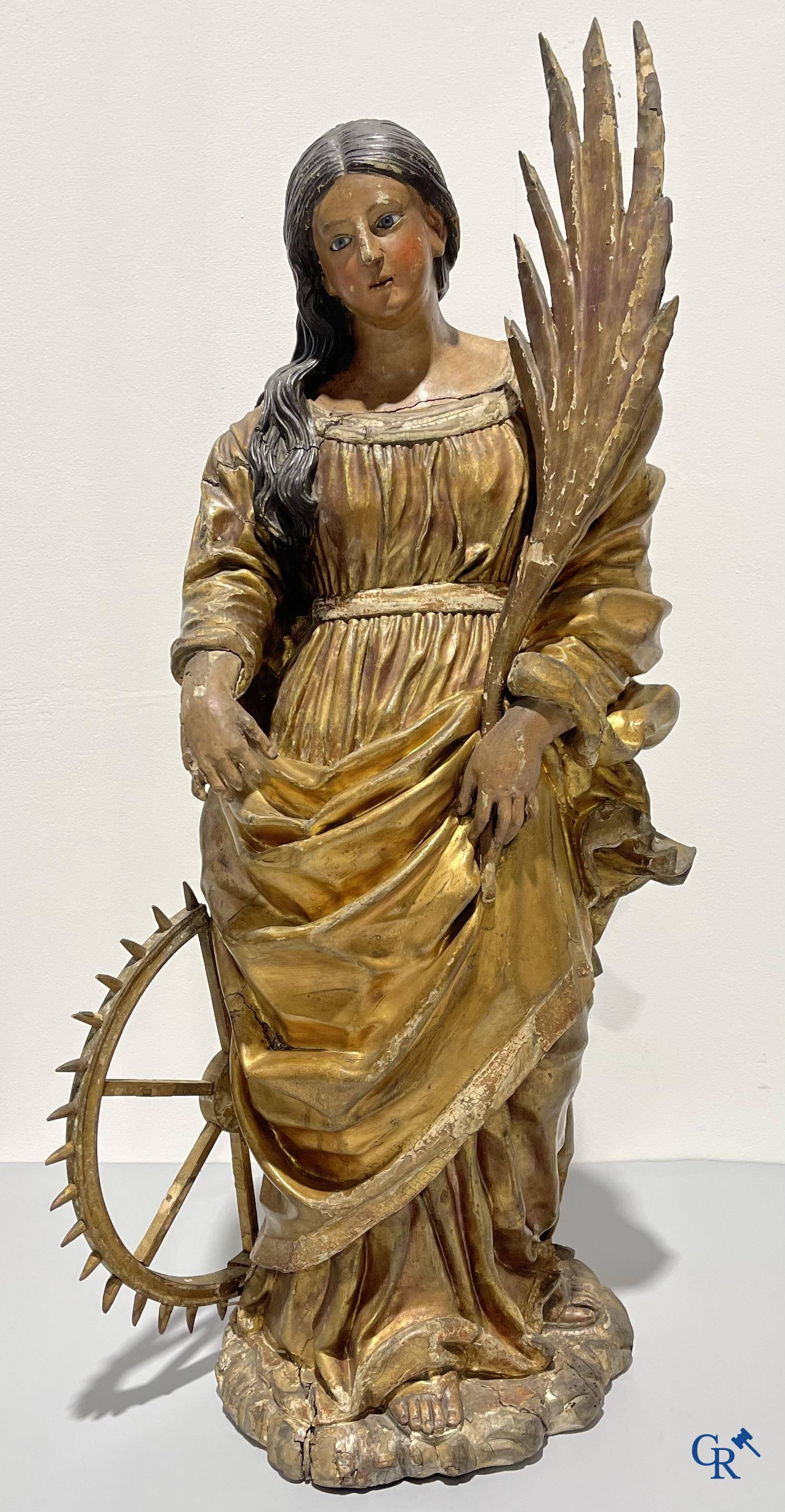 Exceptionally polychrome wooden statue of Saint Catherine of Alexandria with glass eyes, 18th century.