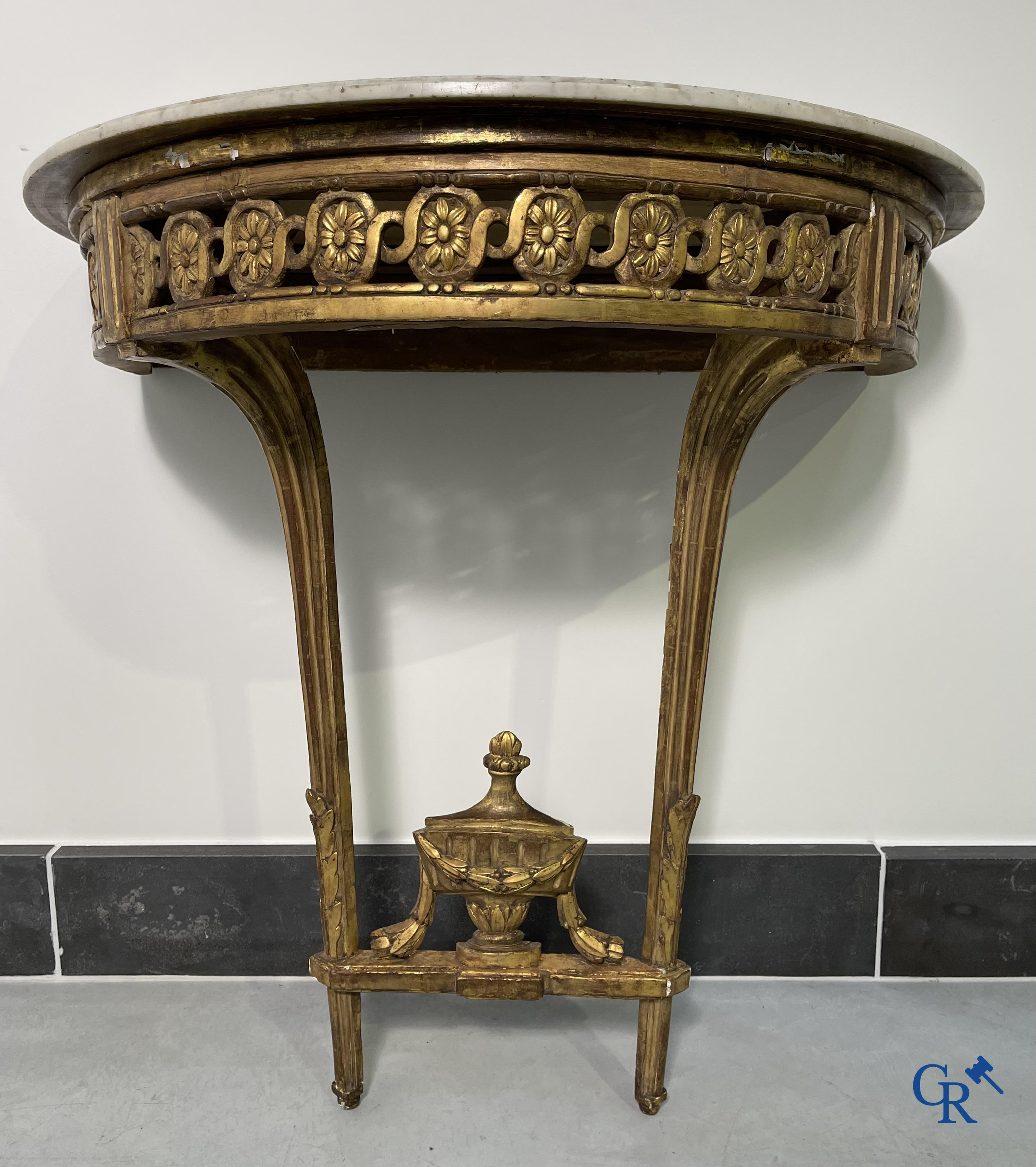 Furniture: Wood sculpted and gilded crescent shaped console. LXVI-period.
