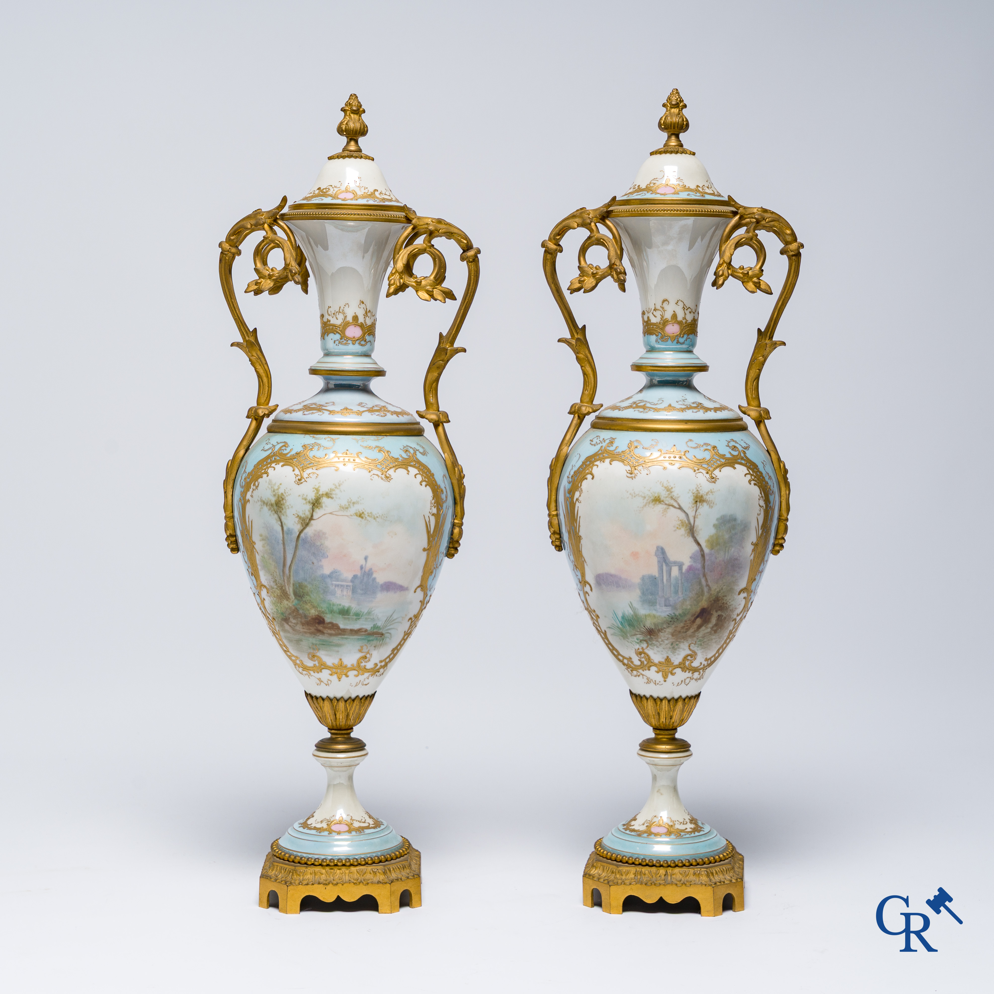 Sèvres, Château des Tuileries, pair of lid vases in light blue porcelain and bronze frame. LXVI style.
