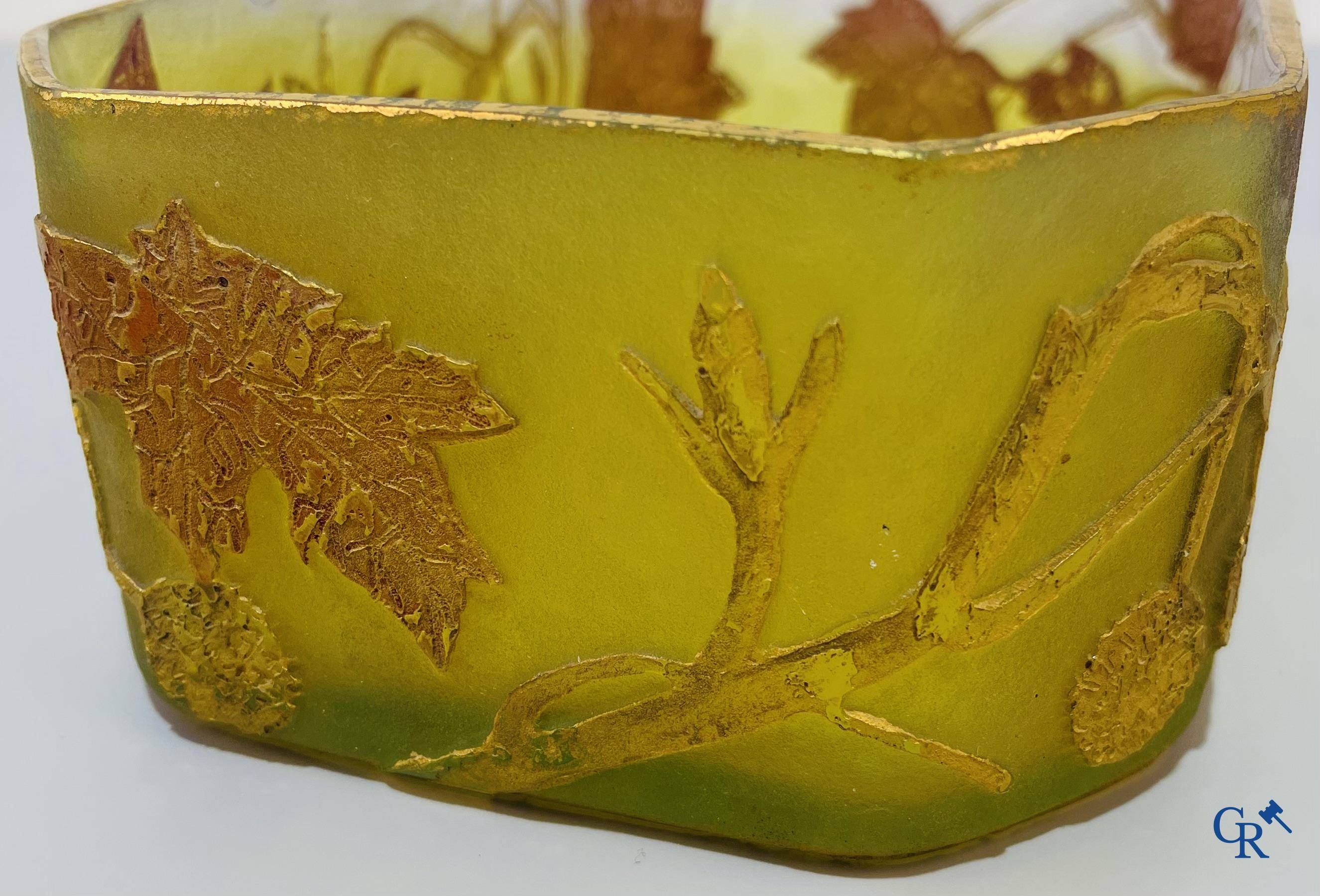 Daum Nancy. Large jardiniere in cameo glass with a decor of chestnut branches on a yellow relief background.