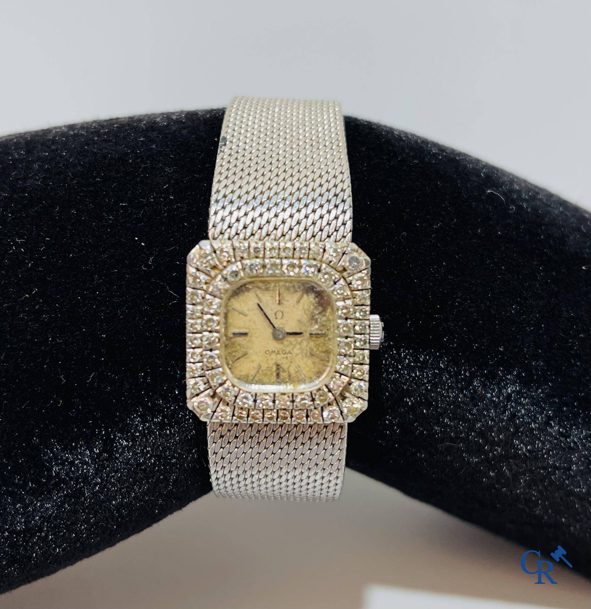 Watches, Swiss work, Omega ladies wristwatch in white gold 750°/00 set with small diamonds.