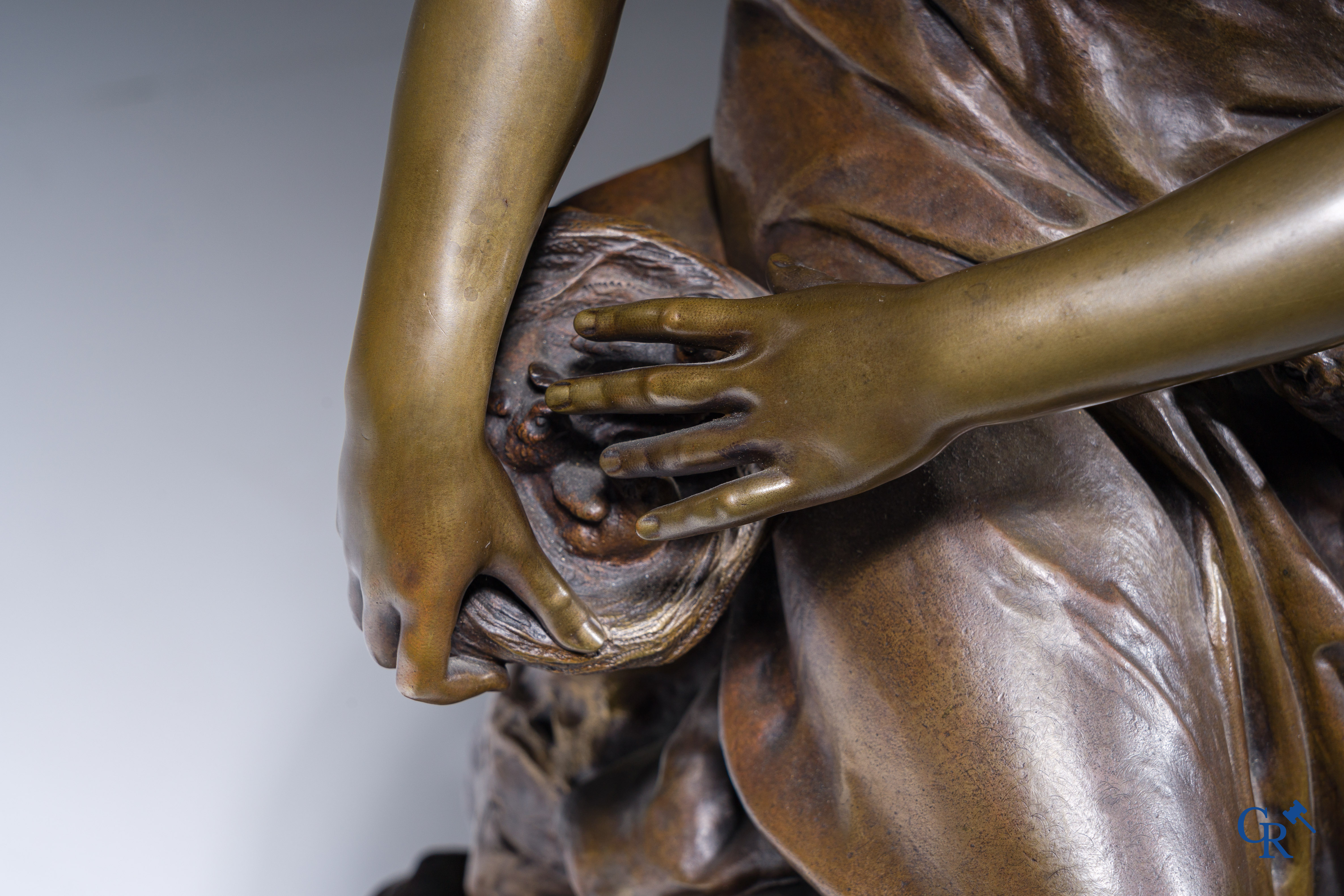 Pierre Louis Détrier (1822-1897) Een imposante pendule in brons en rood geaderde marmer. 19de eeuw.