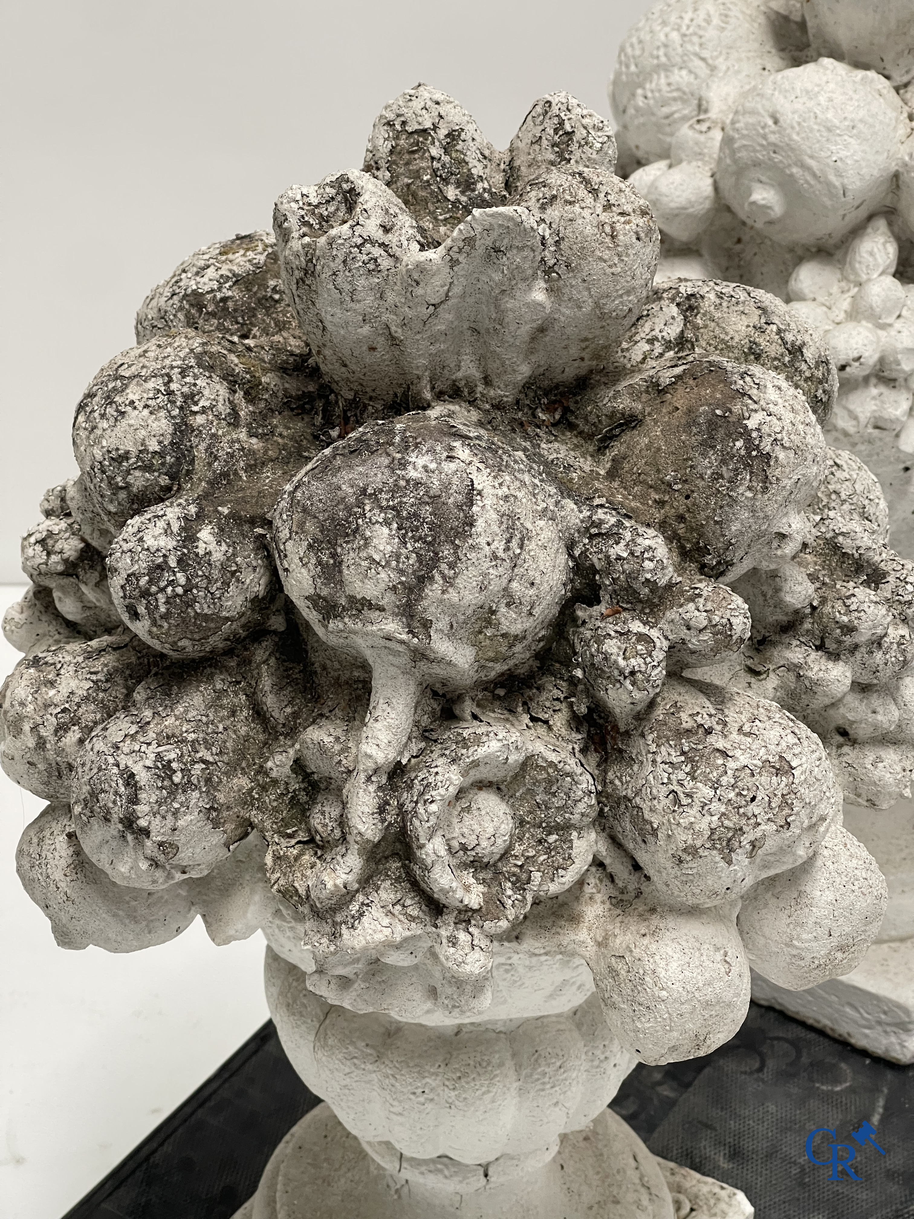 Garden decoration, a pair of stone garden ornaments.