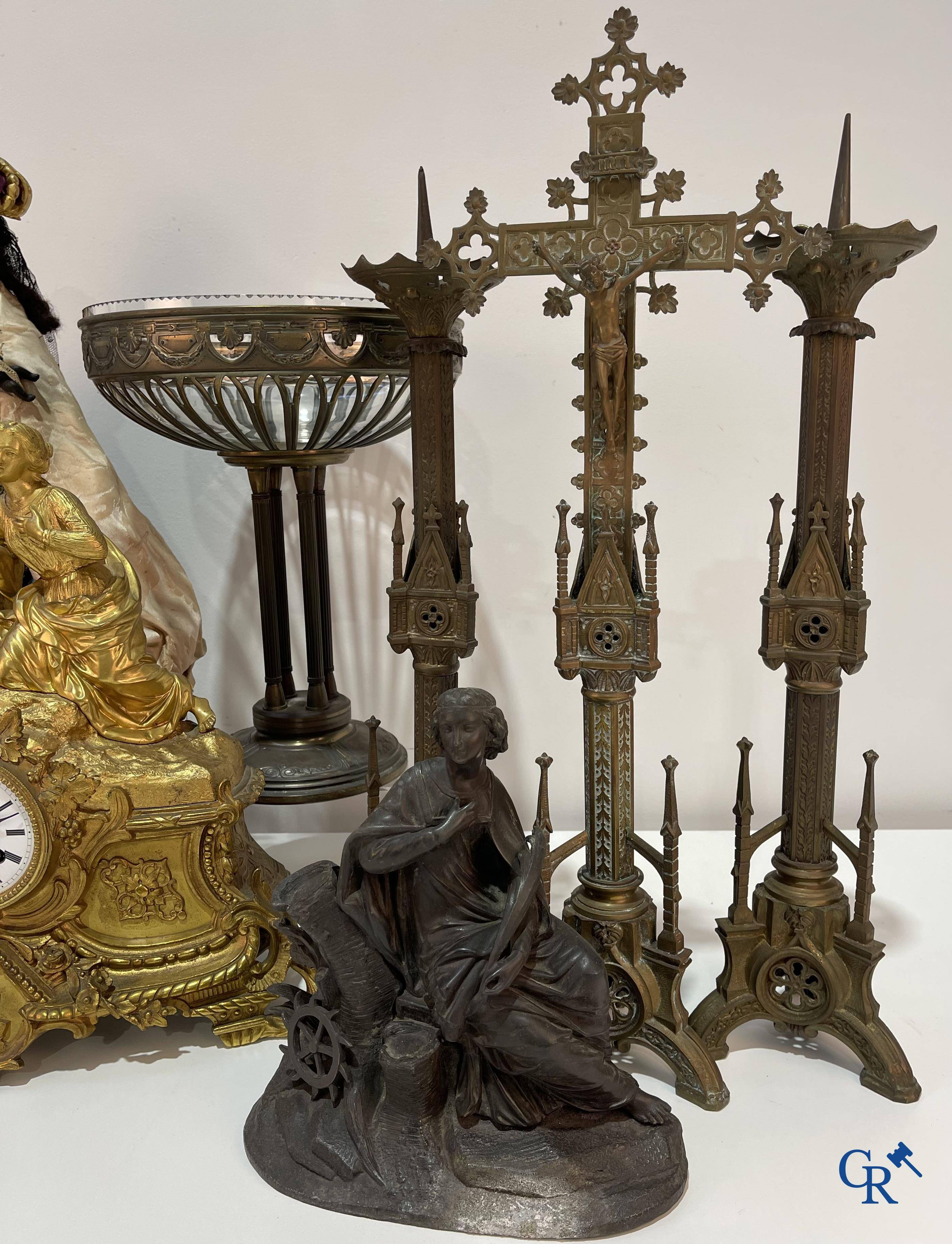 A lot with brocante: Bronze clock, bronze neo Gothic candlesticks and a statue of St. Catharina, soliflore etc.