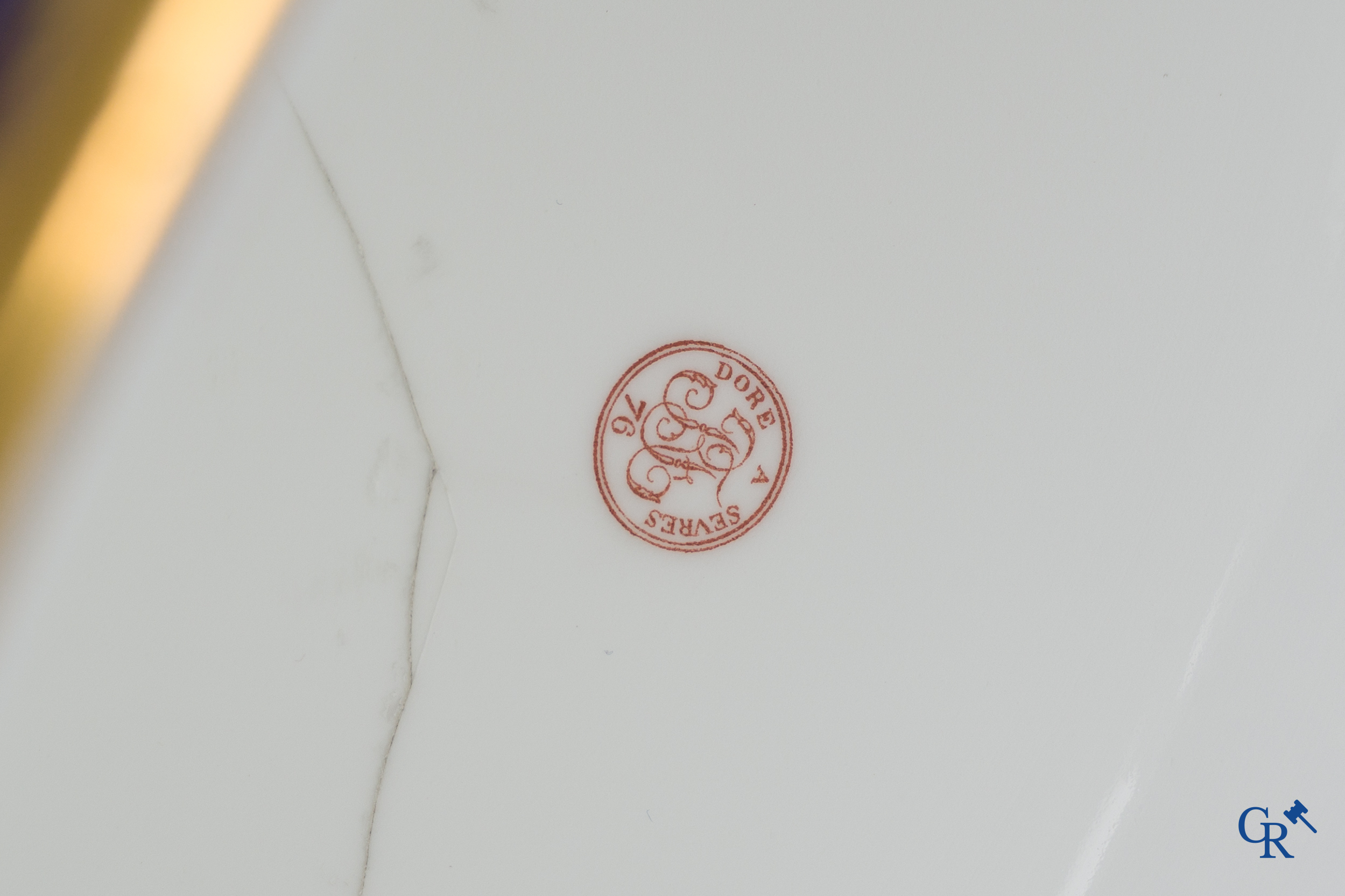 Manufacture Nationale de Sèvres. important vase with a gilded decor on a blue background colour.