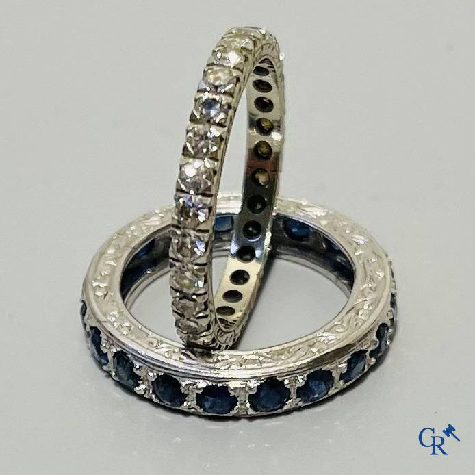 Jewellery, an American wedding ring in white gold 750°/00 and diamonds and a ring in white gold 375°/00 and sapphire.
