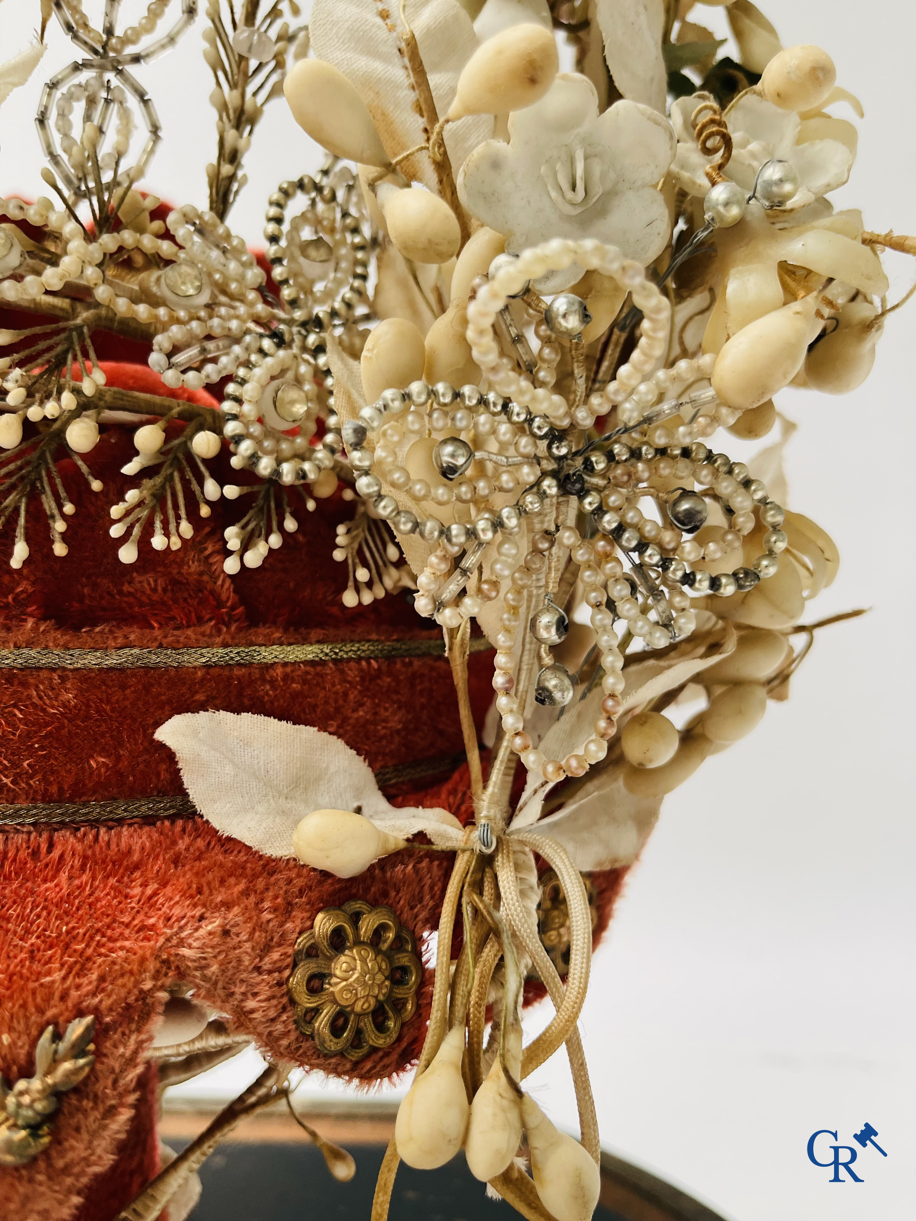 2 domes with wedding bouquet, one with flowers in biscuit, another with mirrors, dated 1908.