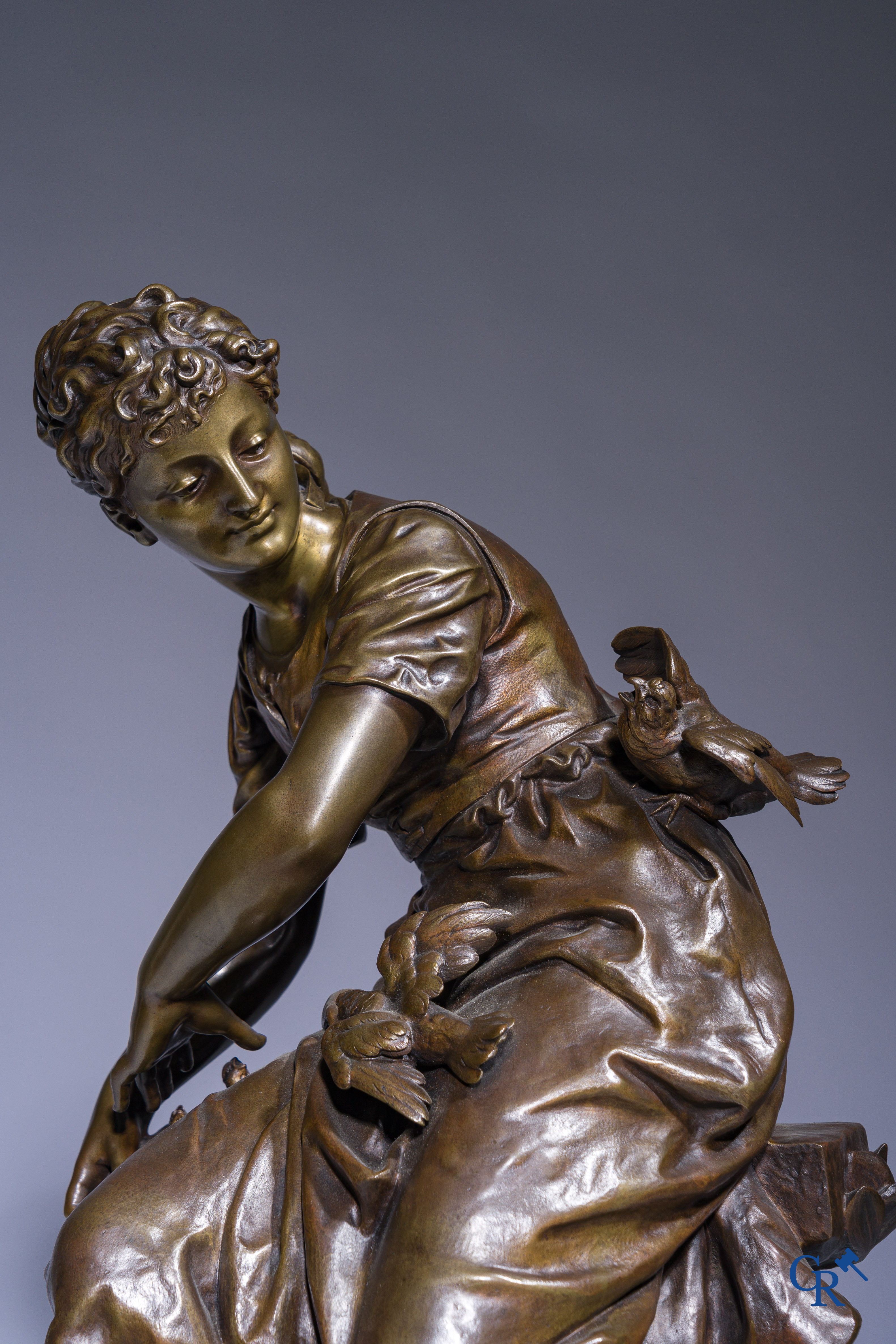 Pierre Louis Détrier (1822-1897) Een imposante pendule in brons en rood geaderde marmer. 19de eeuw.