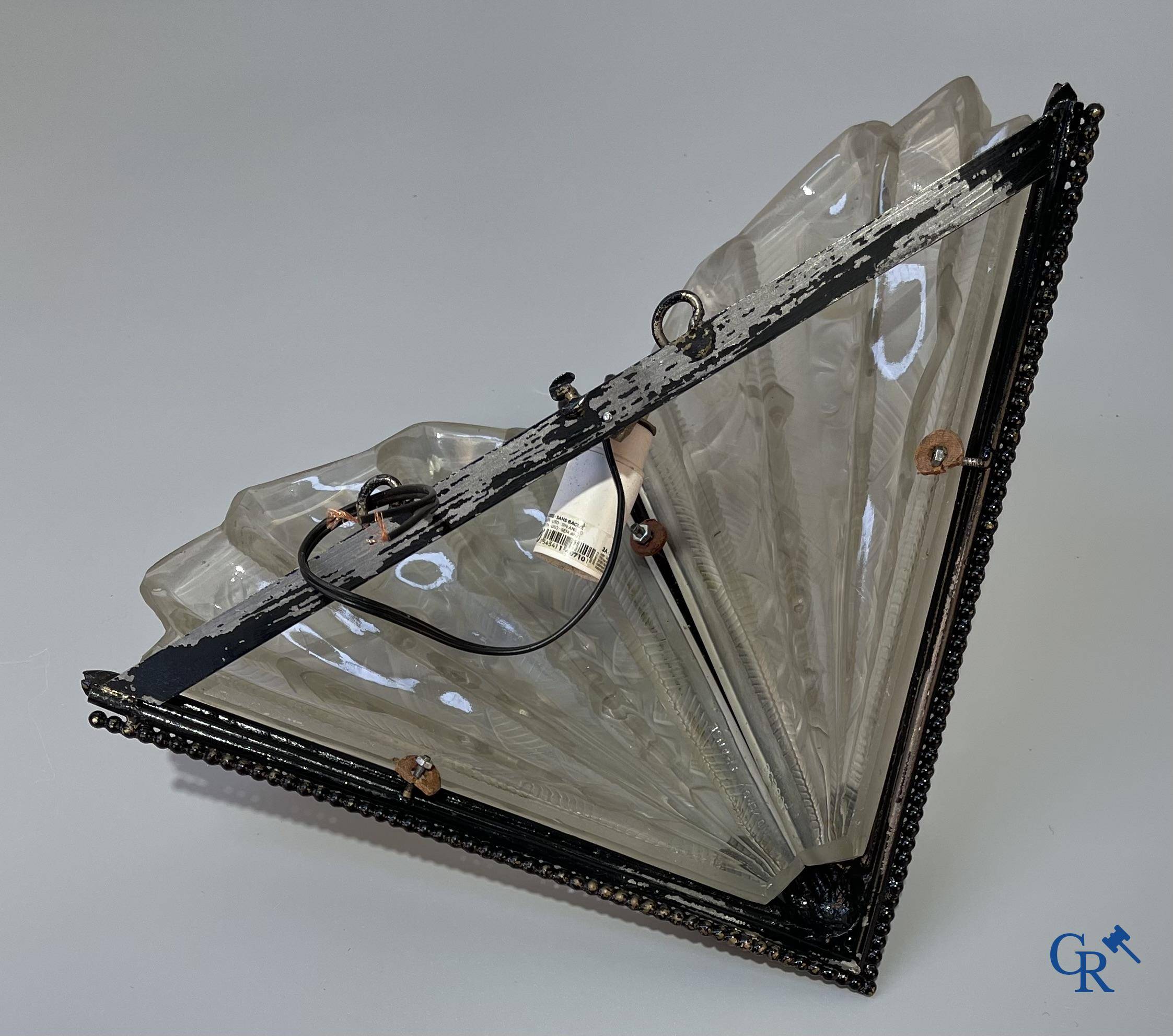 Noverdy France, a large pair of Art Deco wall lights in glass and forging. Circa 1930. Signed.