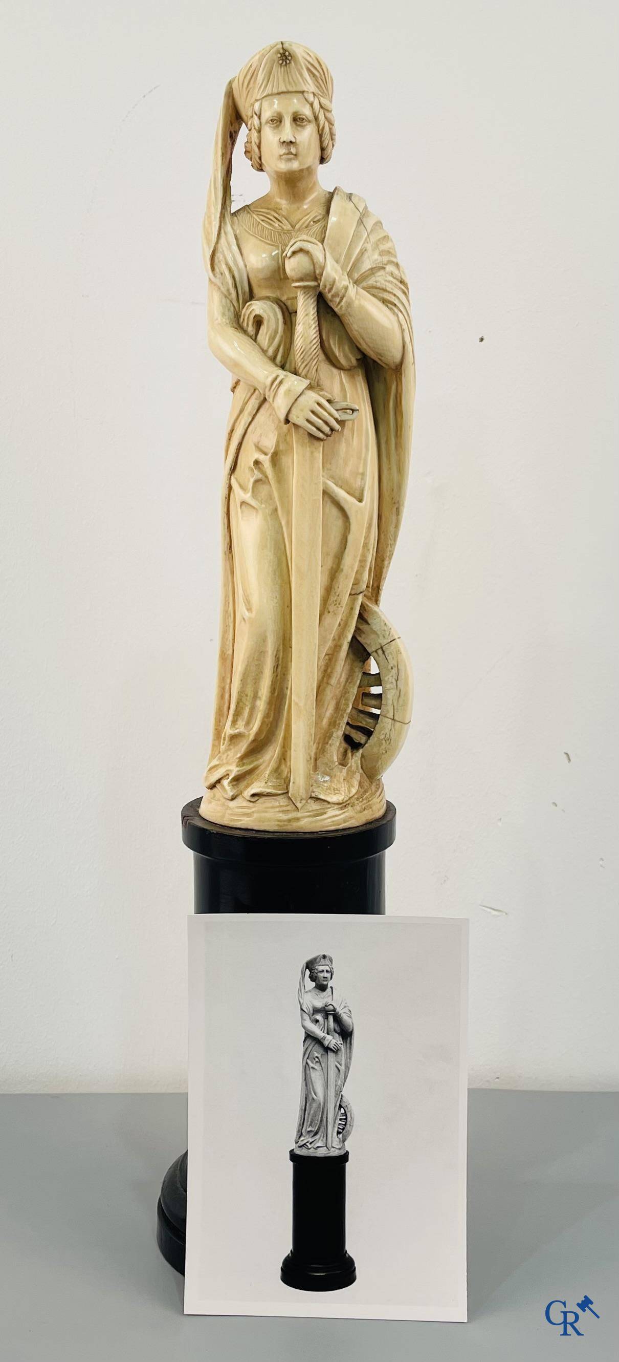 Dieppe, French work, early 19th century. Representation of Catherine of Alexandria in ivory on a pedestal.