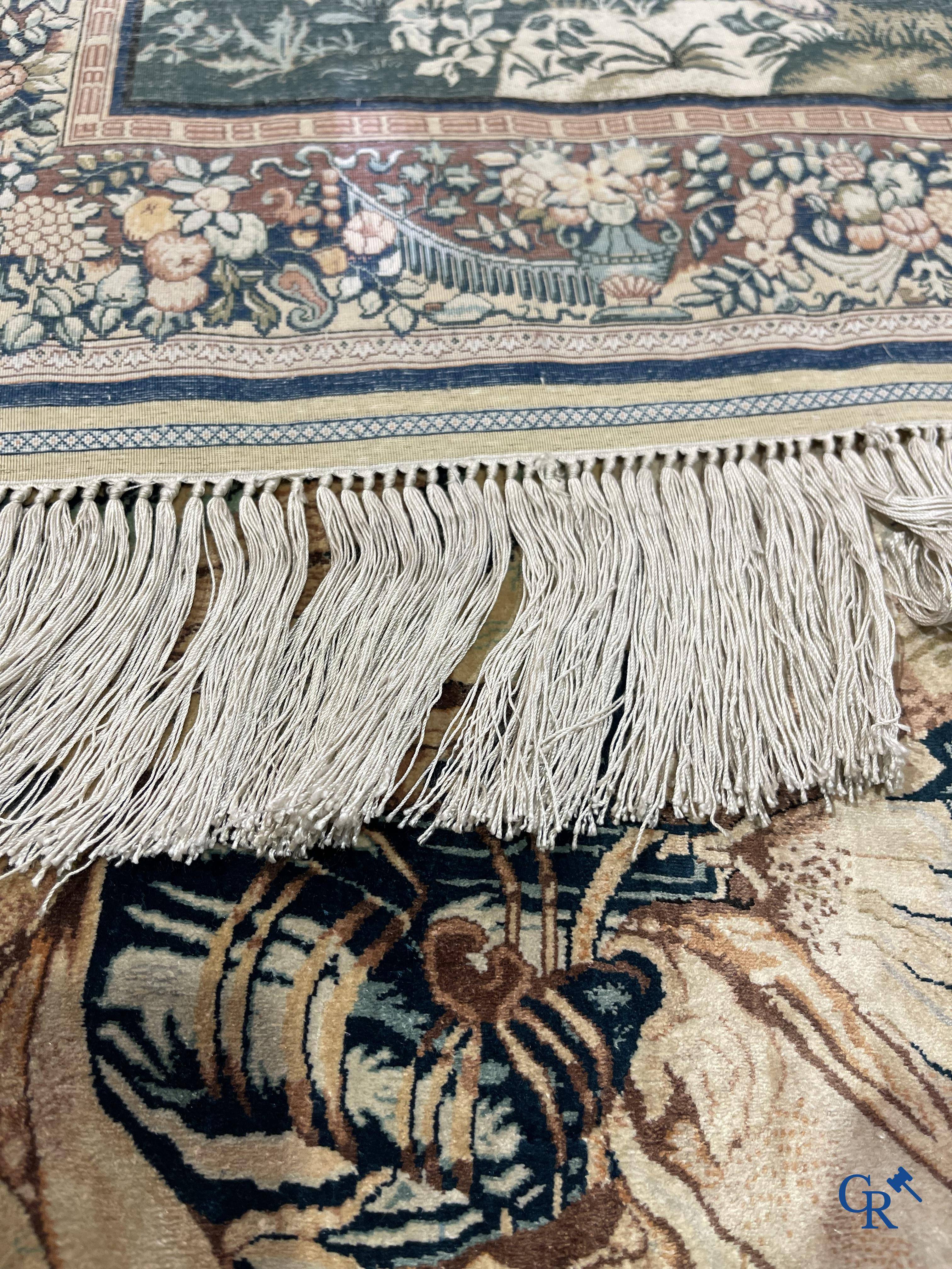 Oriental carpets, a finely knotted silk tapestry with Renaissance scenes. Signed.