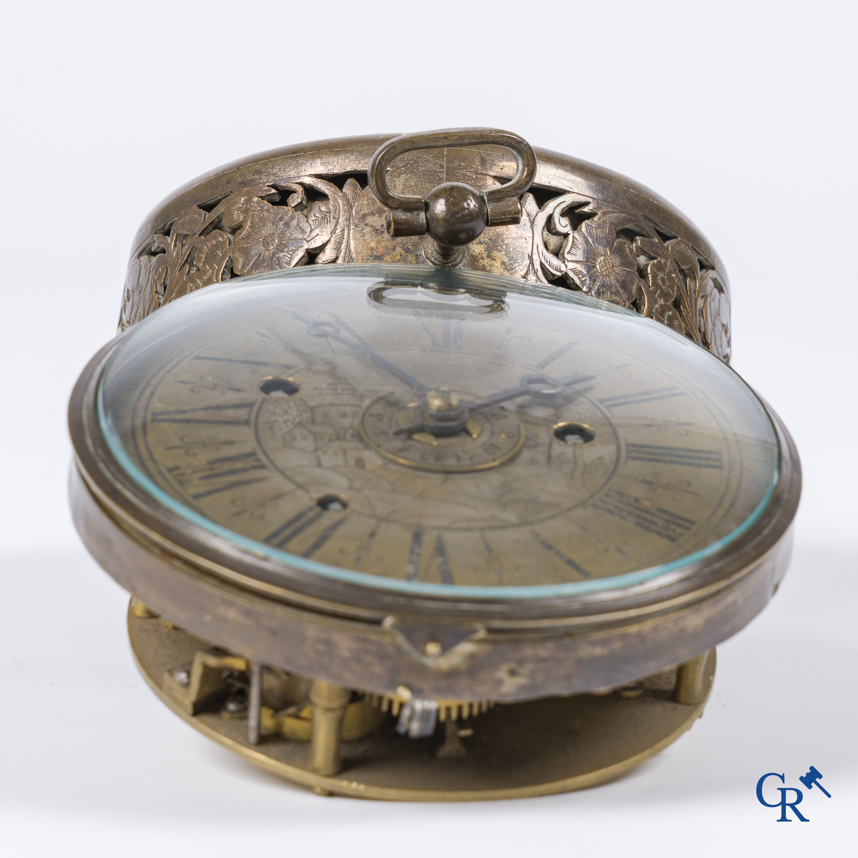 Clocks and watches. Montre de carosse. Large carriage watch with engraved and perforated case. France 17th century.
