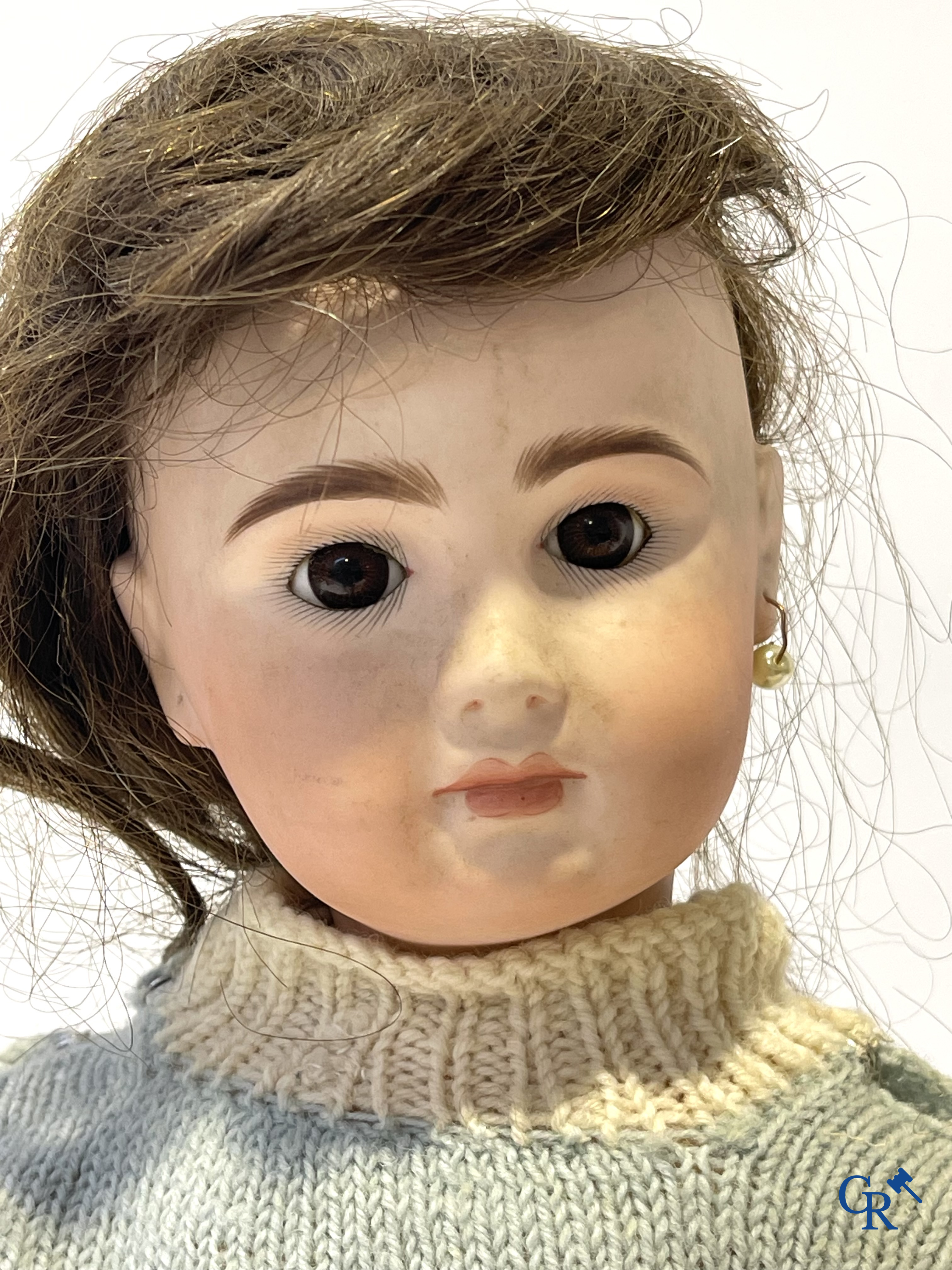 Old toys, 2 antique dolls with porcelain head and an automaton with music. Marked.