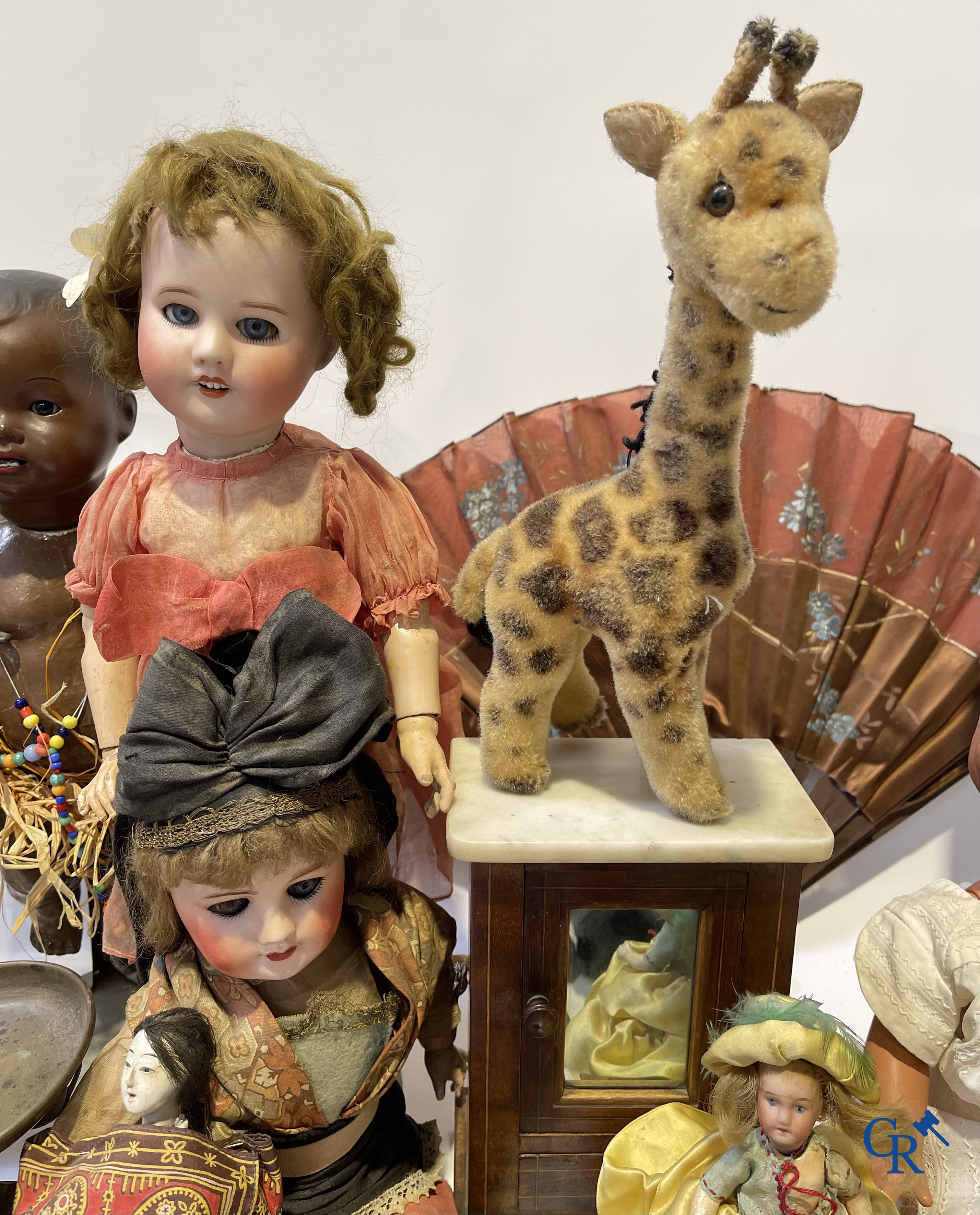 Old toys, a big lot with different antique dolls and collectibles.