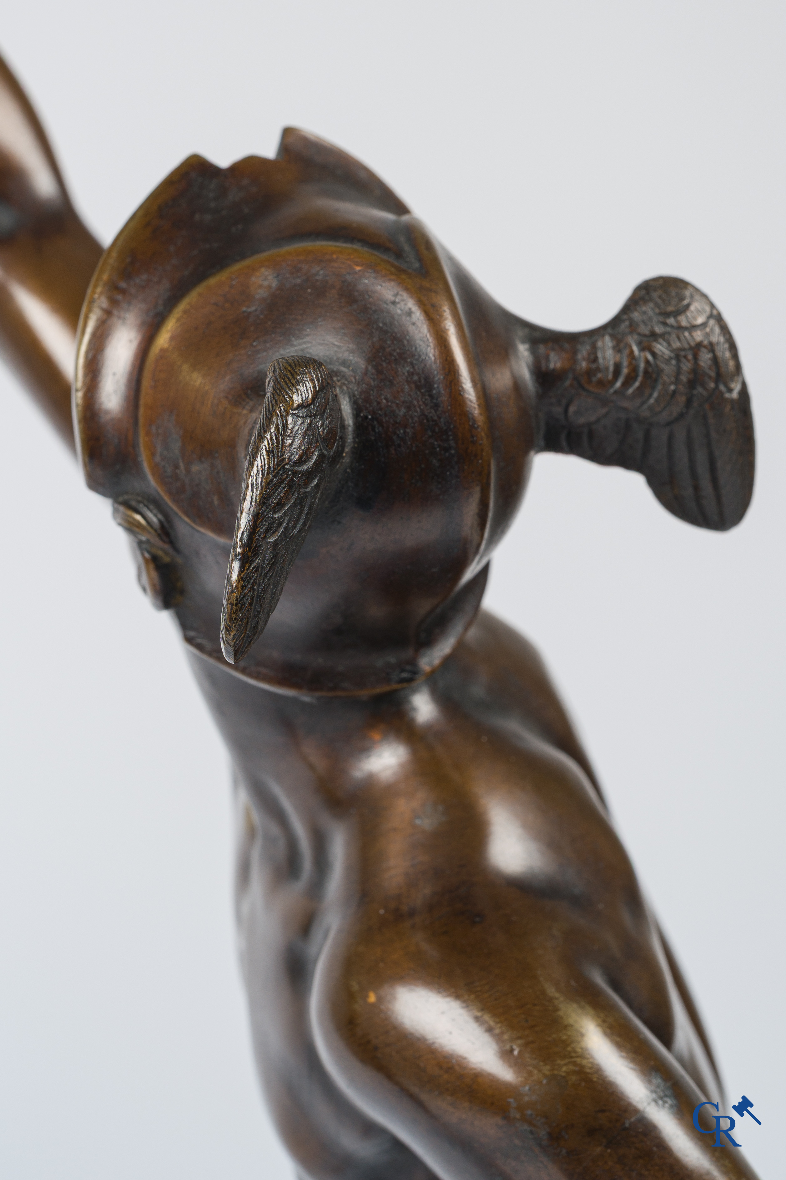 A pair of imposing bronze statues in the antique style after a model by Jean De Bologne.