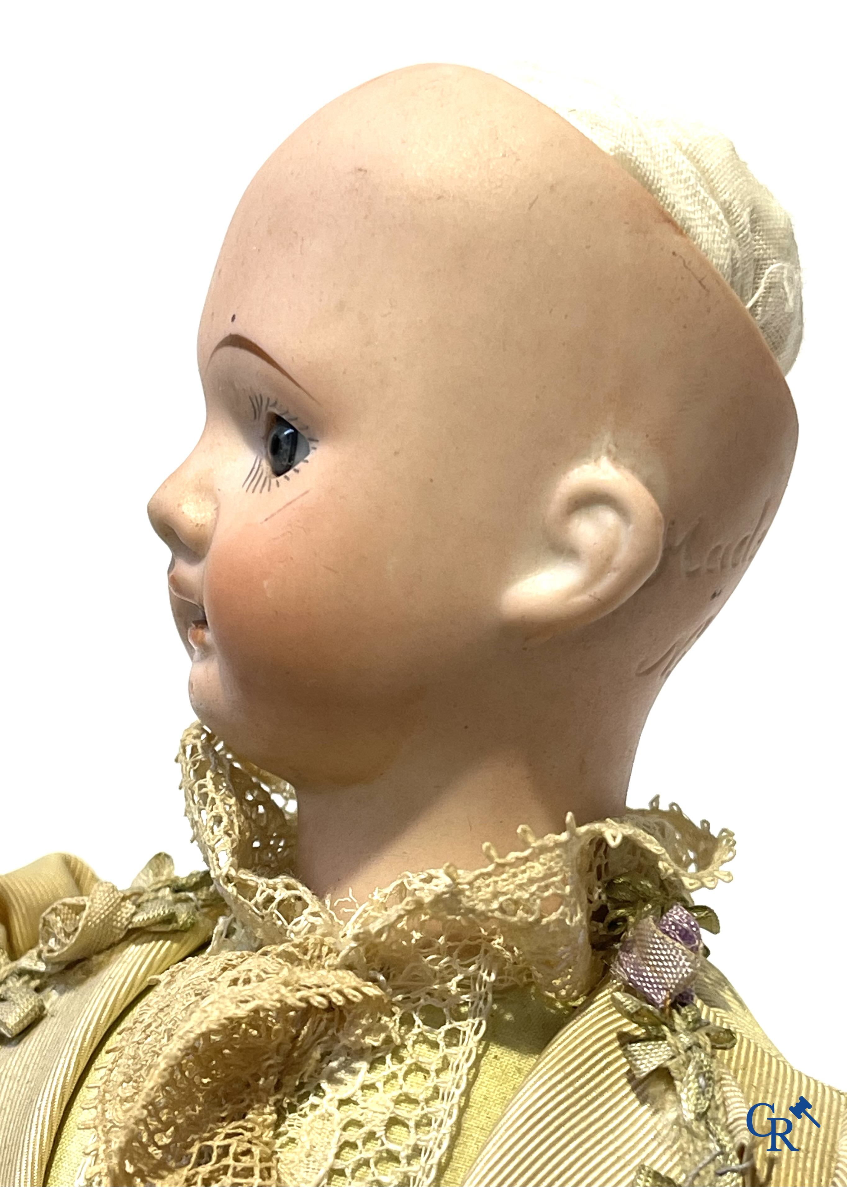 Old toys, 2 antique dolls with porcelain head and an automaton with music. Marked.