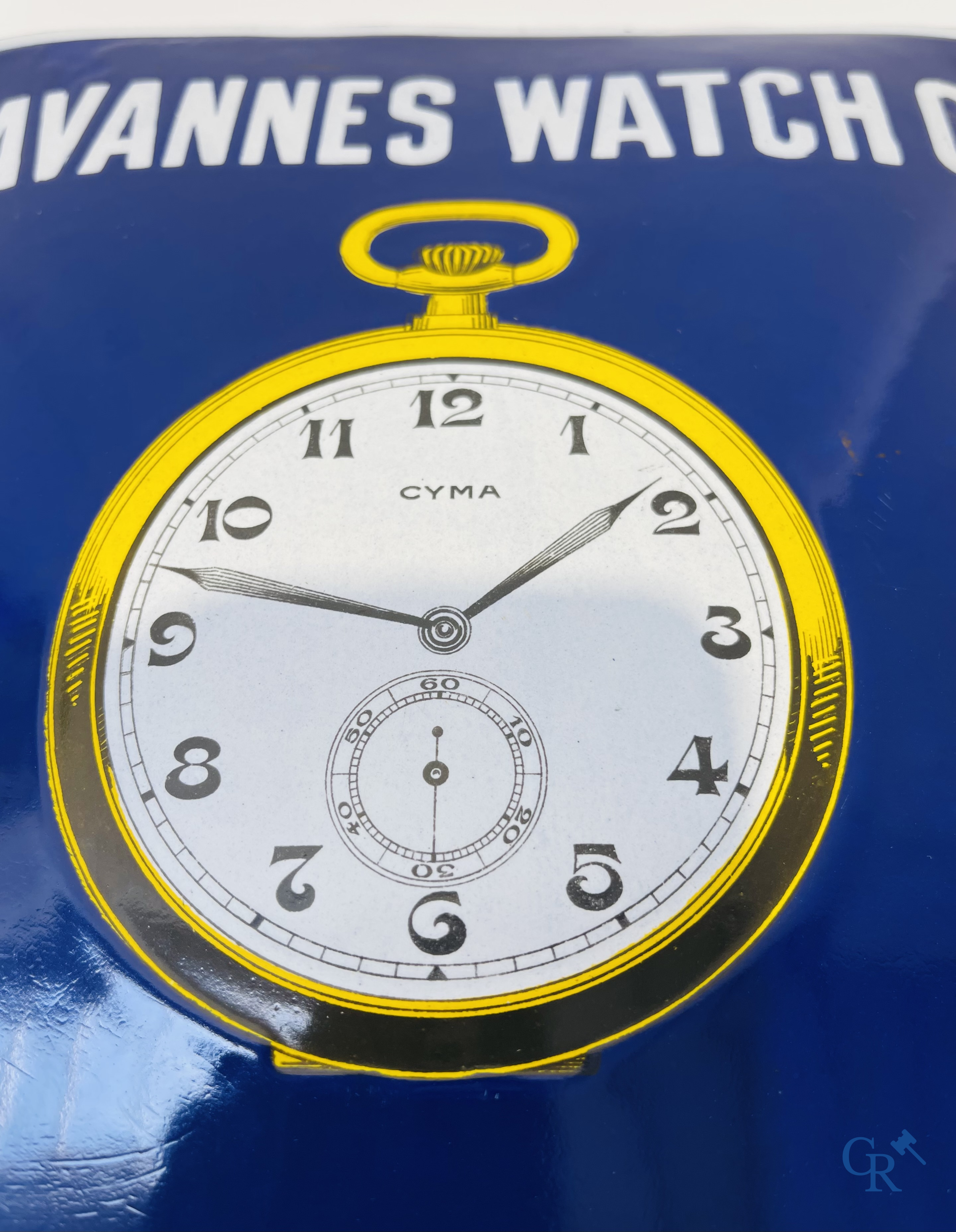 Tavannes Watch Company. Bombed enamel advertising sign for Cyma wrist and pocket watches. 1926.