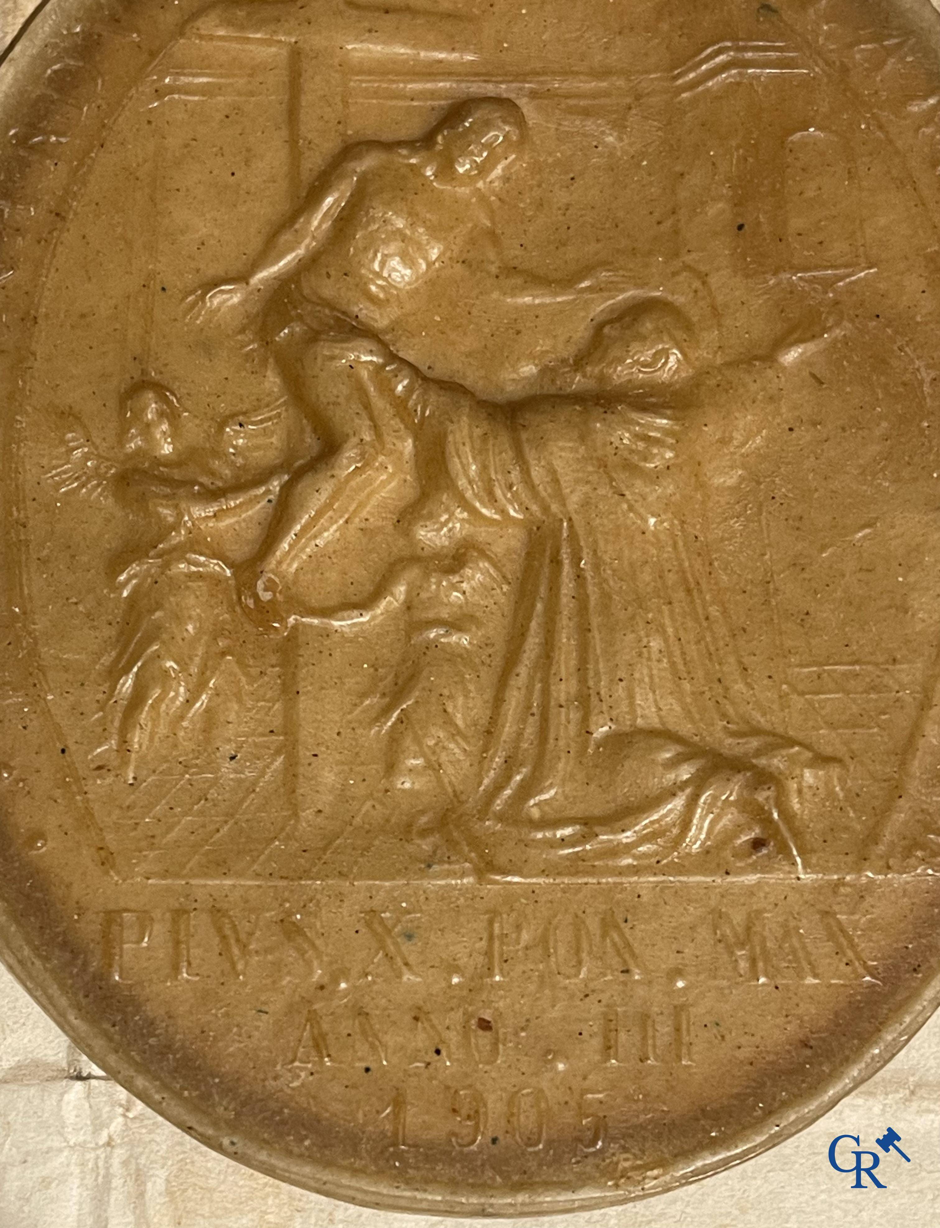 Religious objects, Agnus Dei in wax, blessed by Pope Pius X in 1905, with the image of Bernard of Clairvaux.