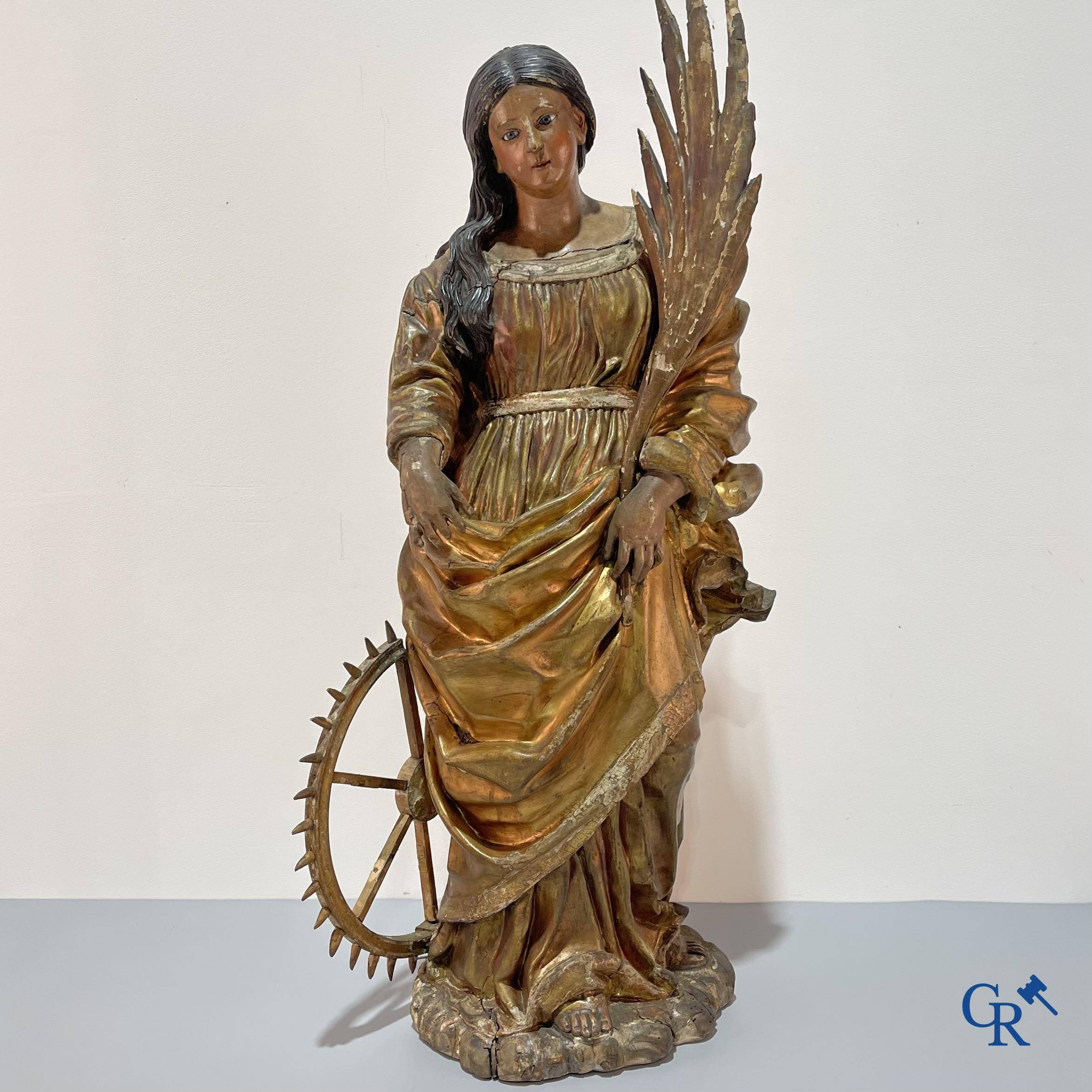 Exceptionally polychrome wooden statue of Saint Catherine of Alexandria with glass eyes, 18th century.