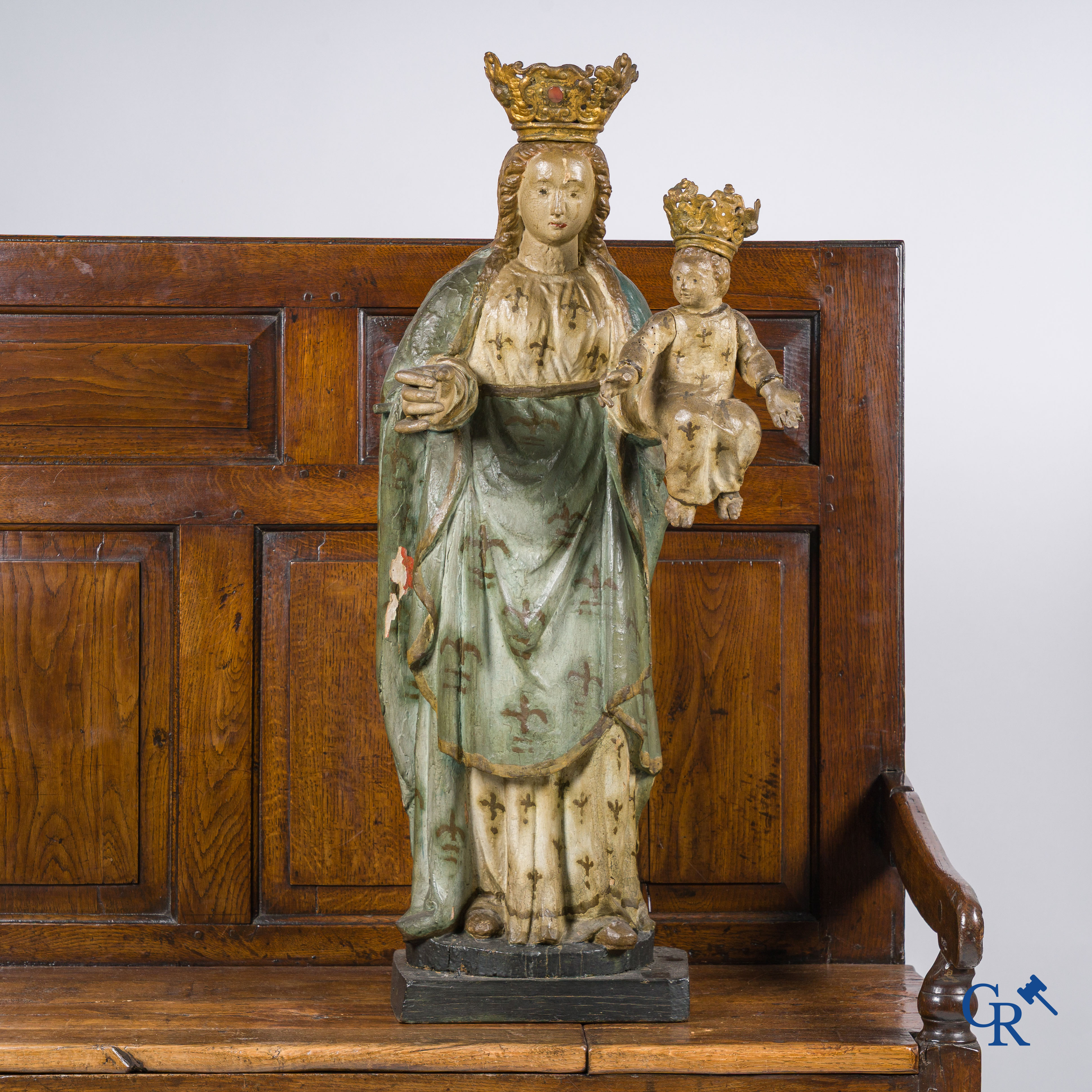 Wooden polychrome Baroque sculpture of Mary with child. The Crown inlaid with an amber-like rock.