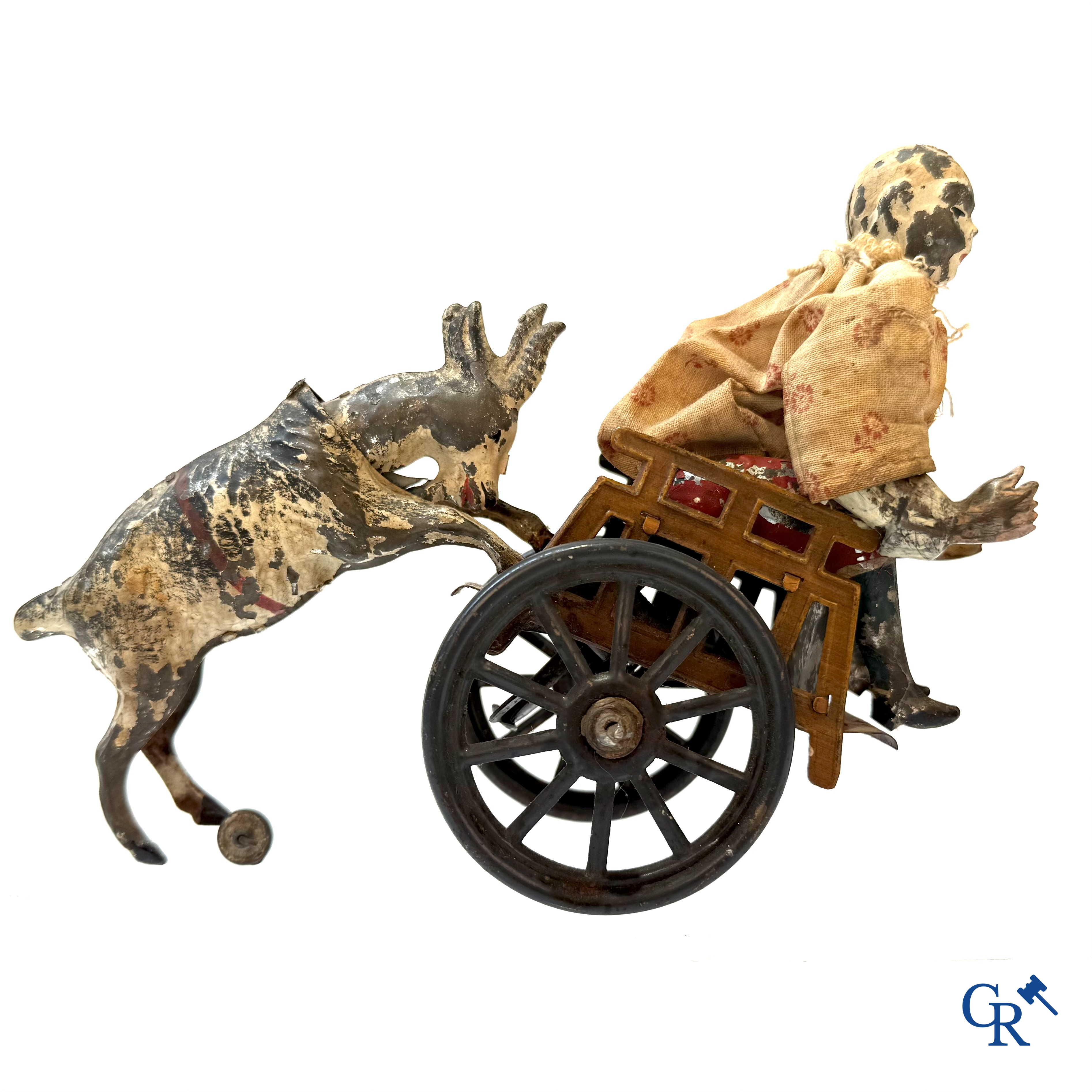 Günthermann. A mechanically painted tin toy, pierrot with goat. Germany circa 1910.