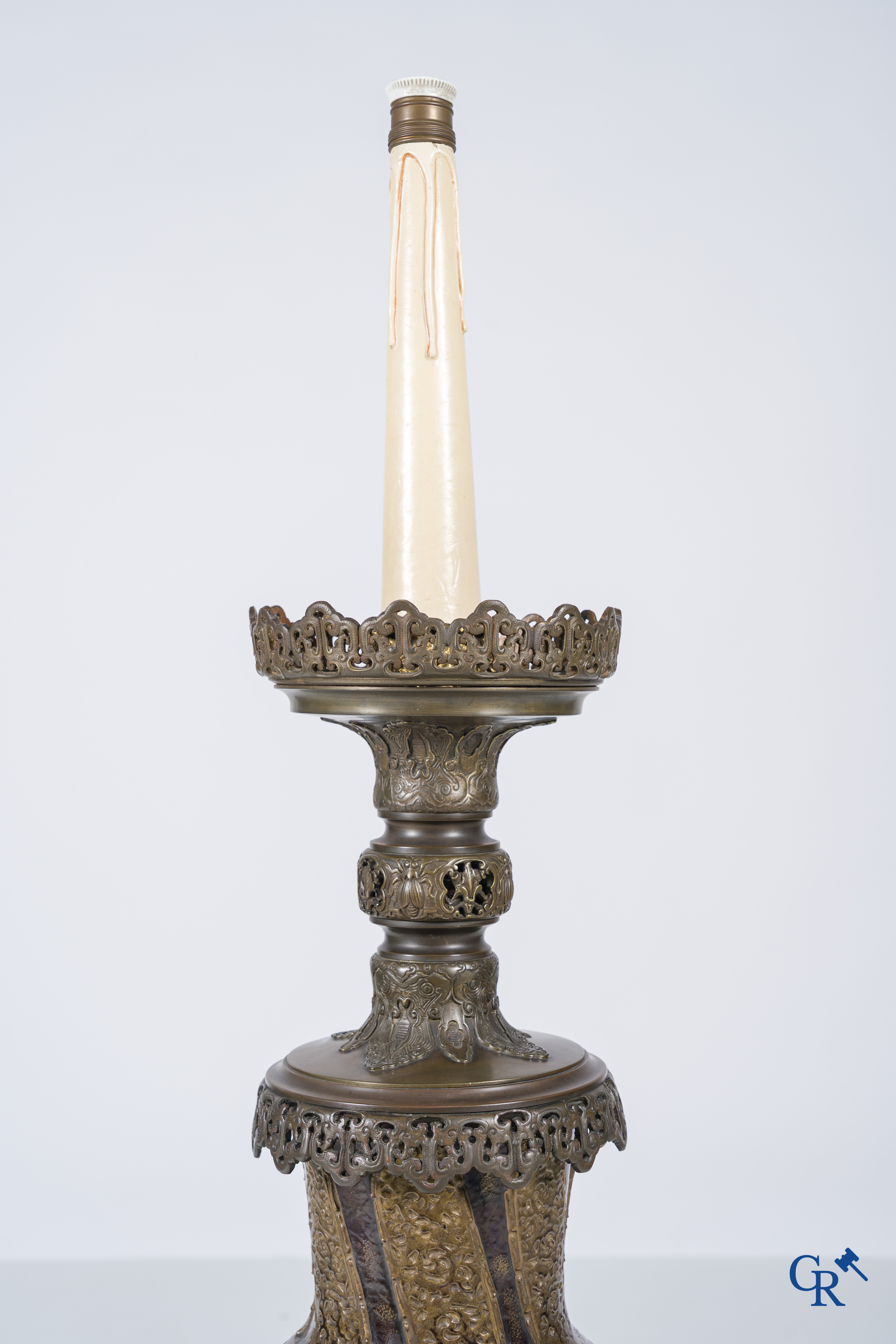 An imposing vase in French faience with bronze frames in Japonizing style mounted as a lamp. Circa 1890.