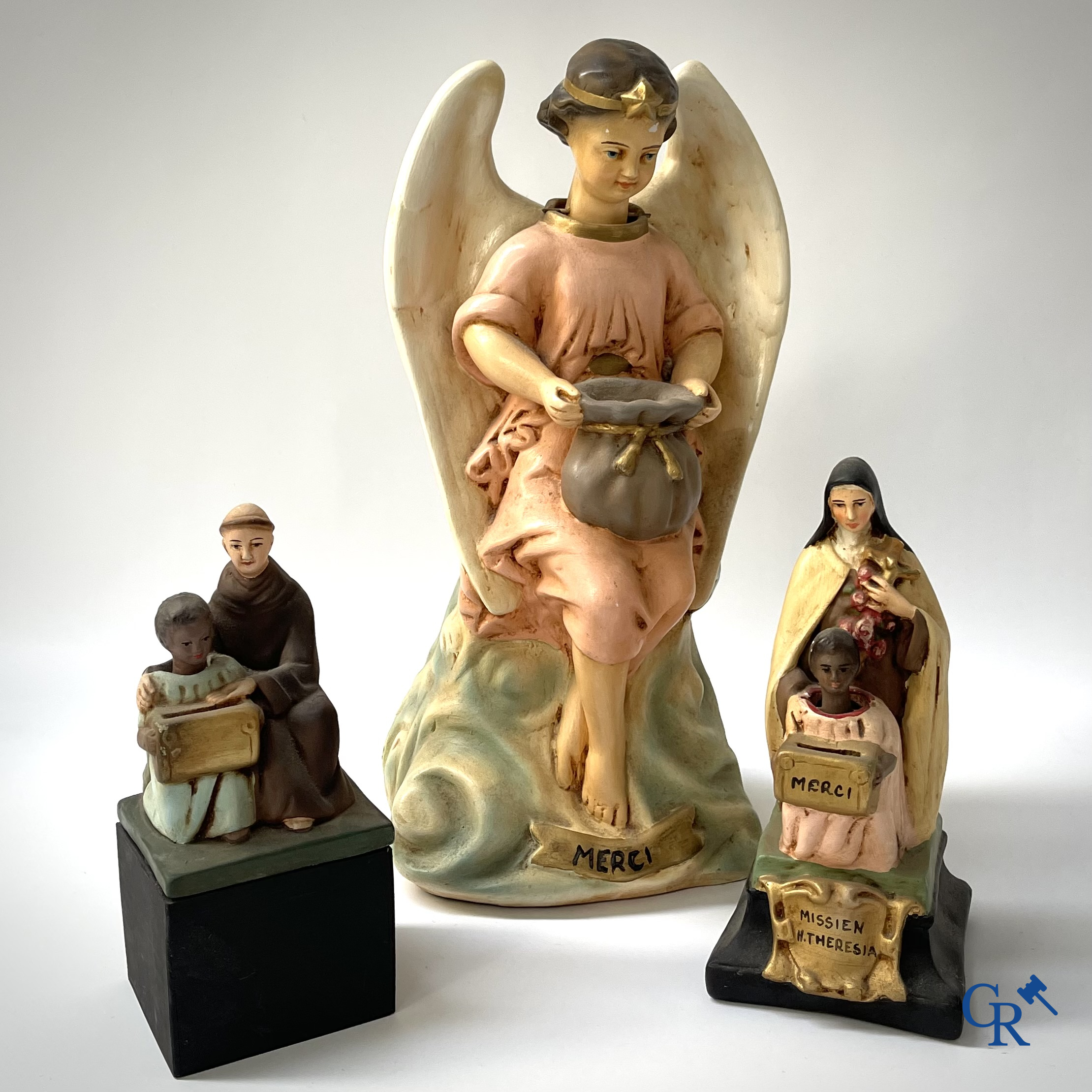 3 plaster piggy banks with nodding heads for the benefit of the Holy Missions.