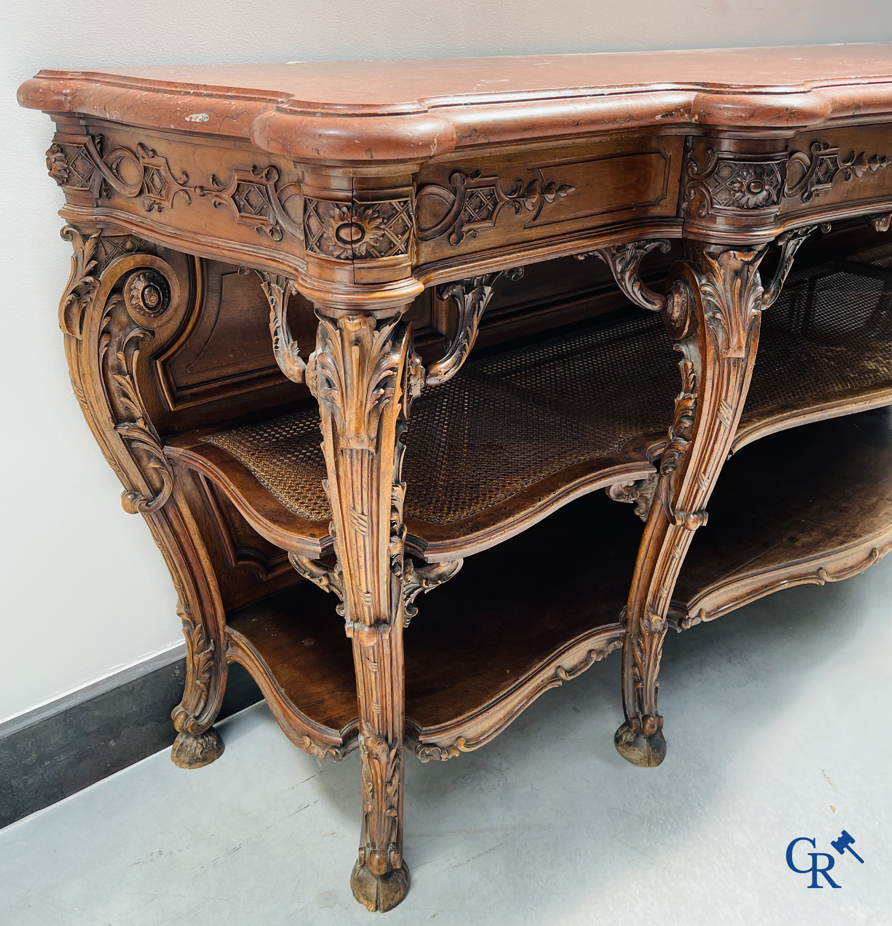 Maison Roll, 42, Rue Faubourg St. Antoine Paris. An exceptionally dessert furniture in carved walnut. LXVI style.