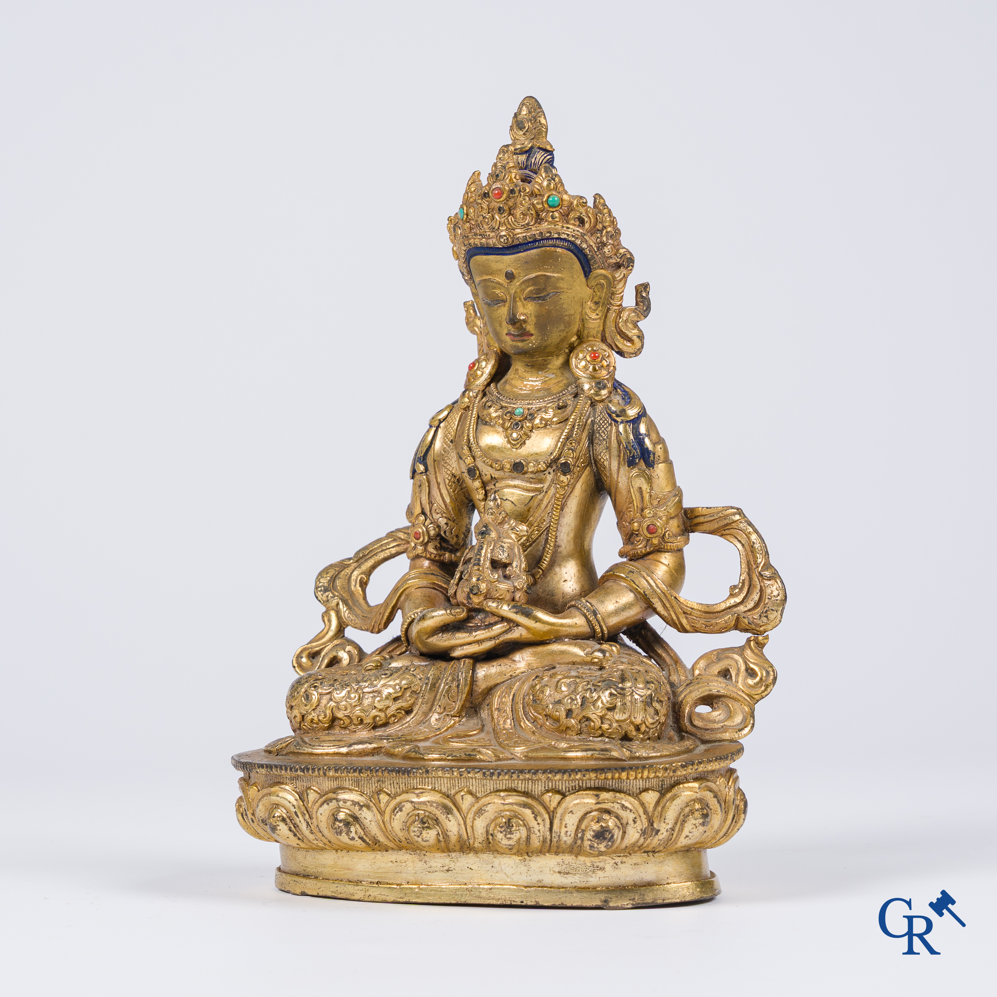Asian Art, Tibet, a Chinese gilded Buddha Amitayus. Bronze with turquoise and coral inlay.