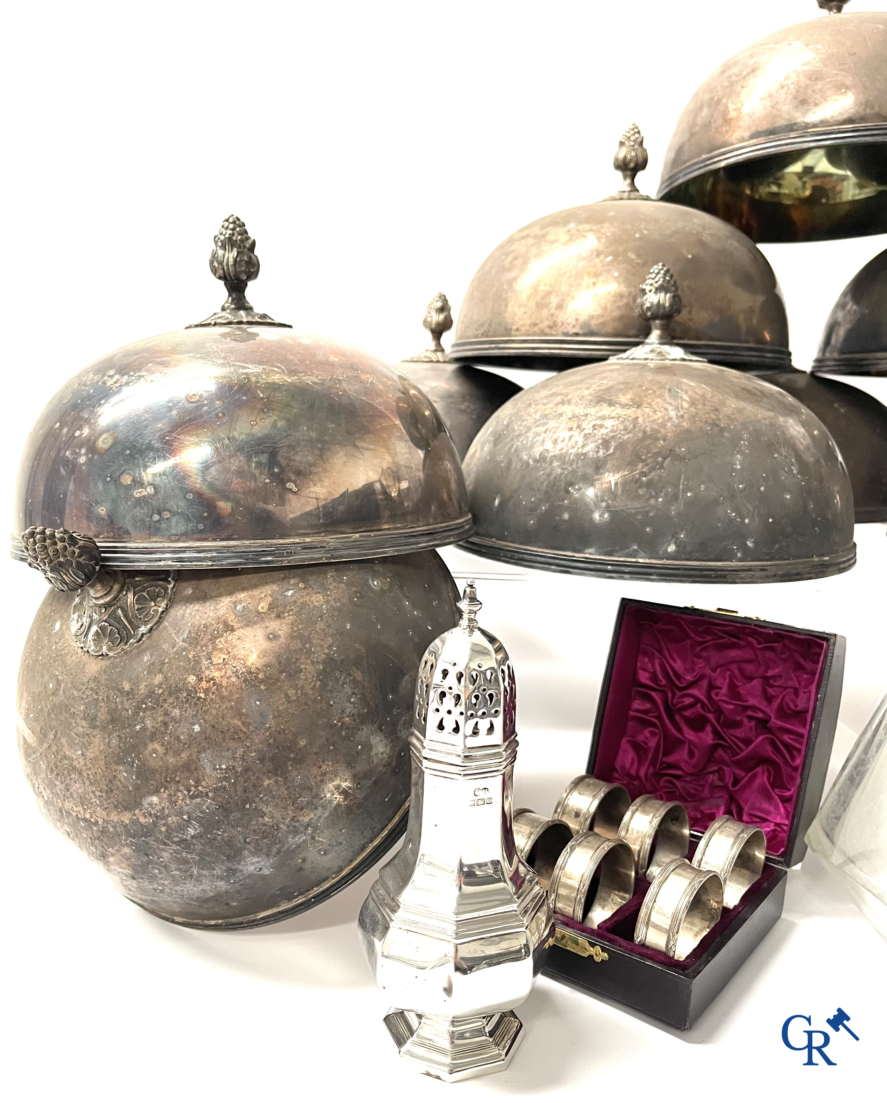 A set of 10 silver-plated metal table bells, a carafe with silver frame, silver napkin rings, a sprinkler bus, etc.