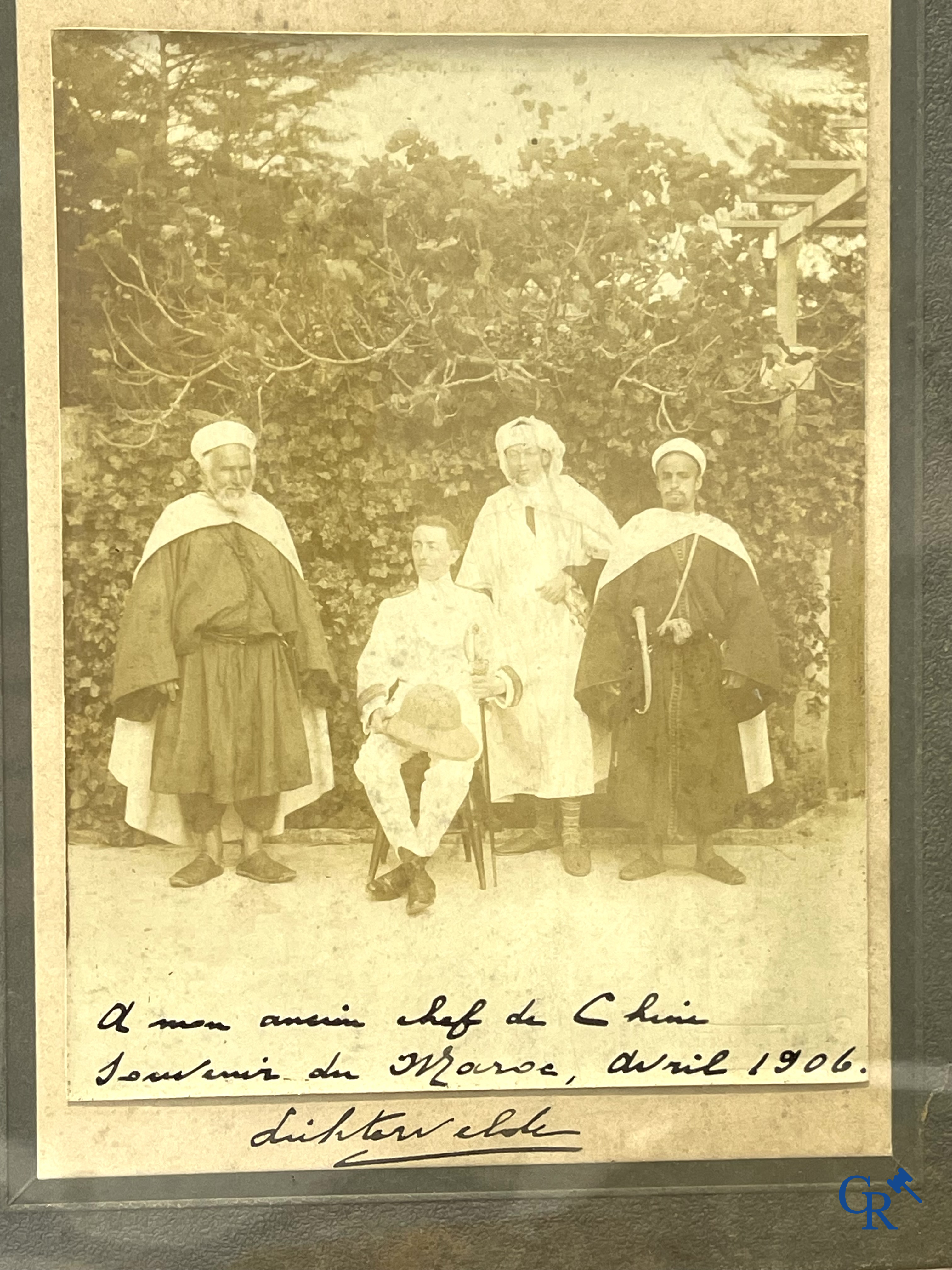 A nice lot of brocante, carafe with silver mounts, painting, wooden bust, old photo, etc.