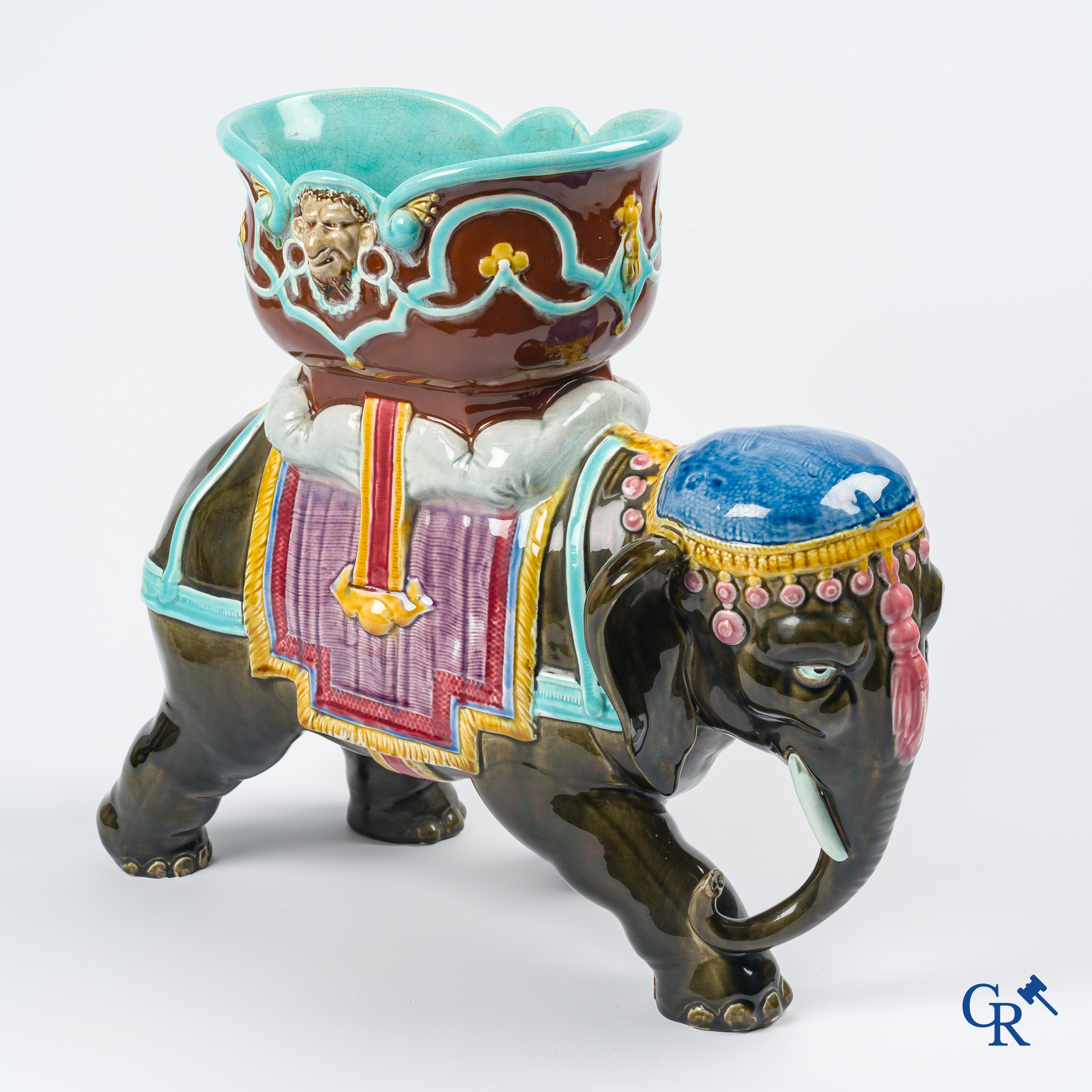 Orchies. A large elephant in multicolored decorated pottery, barbotine. France, circa 1900.