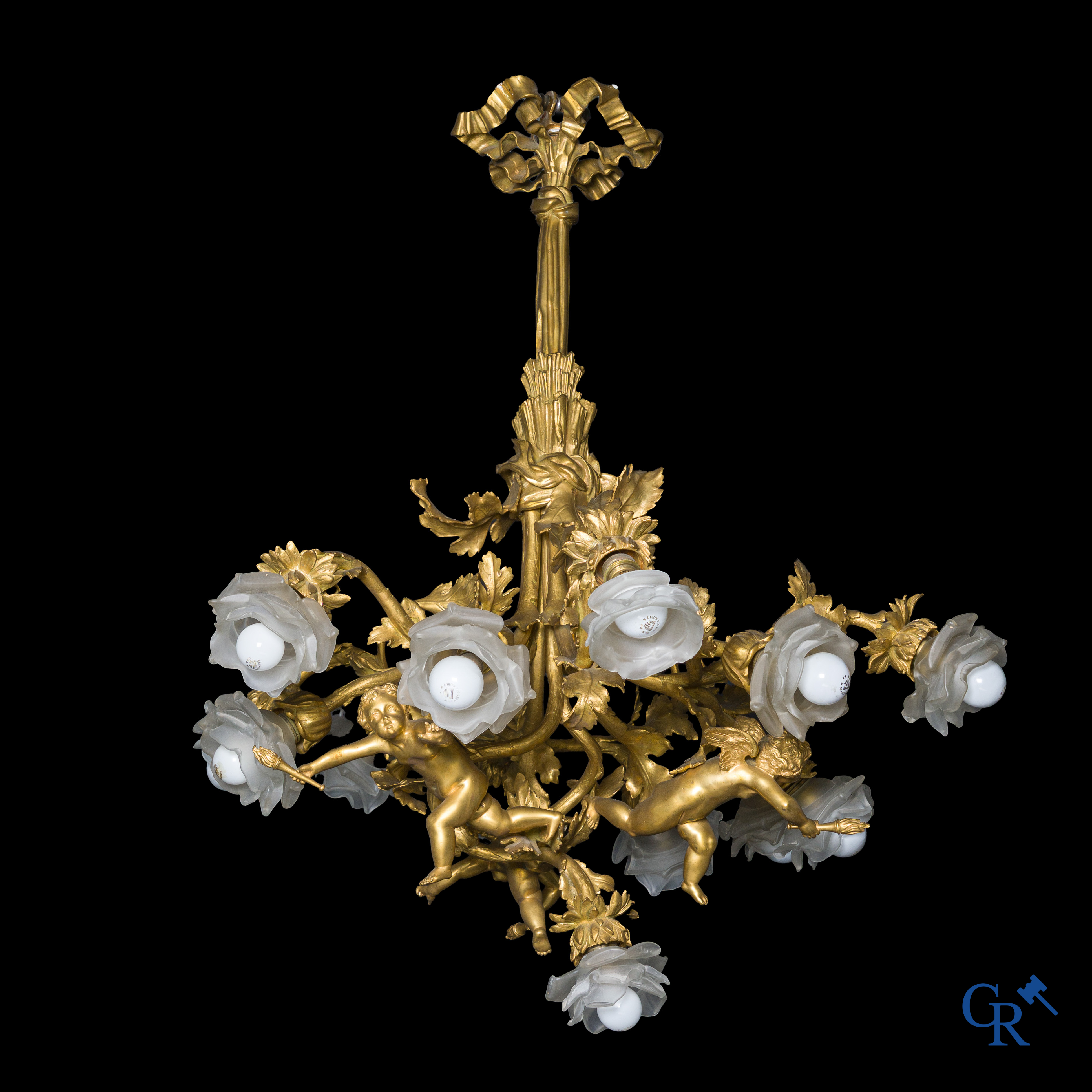 An imposing bronze gilded Napoleon III chandelier with 3 putti and 13 light points. LXVI style.
