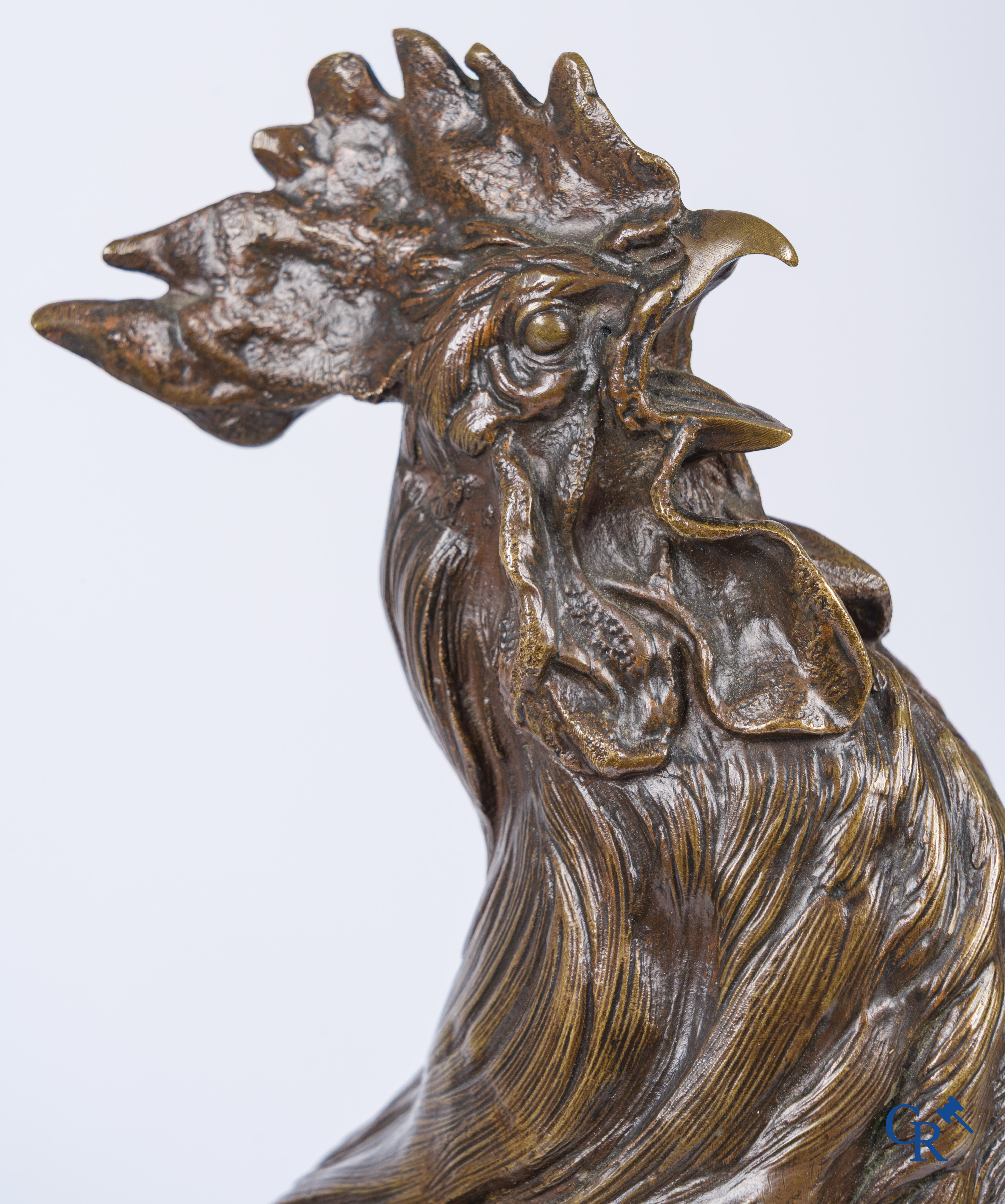 A Barye. Bronzen haan met bruine patine. Gesigneerd. 19e eeuw.