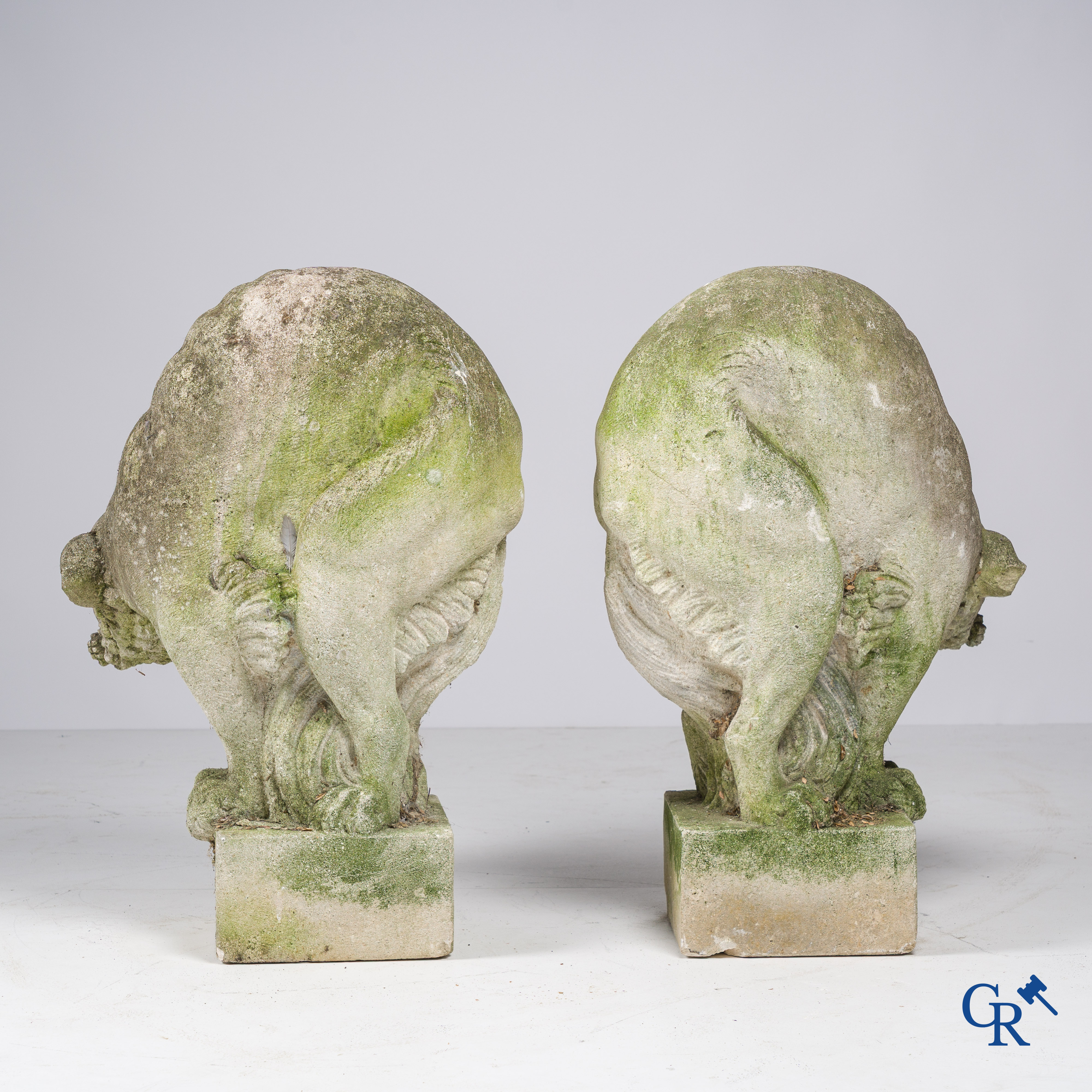 Exceptionally pair of large ornaments depicting cats in hand-sculpted limestone. Circa 1900.