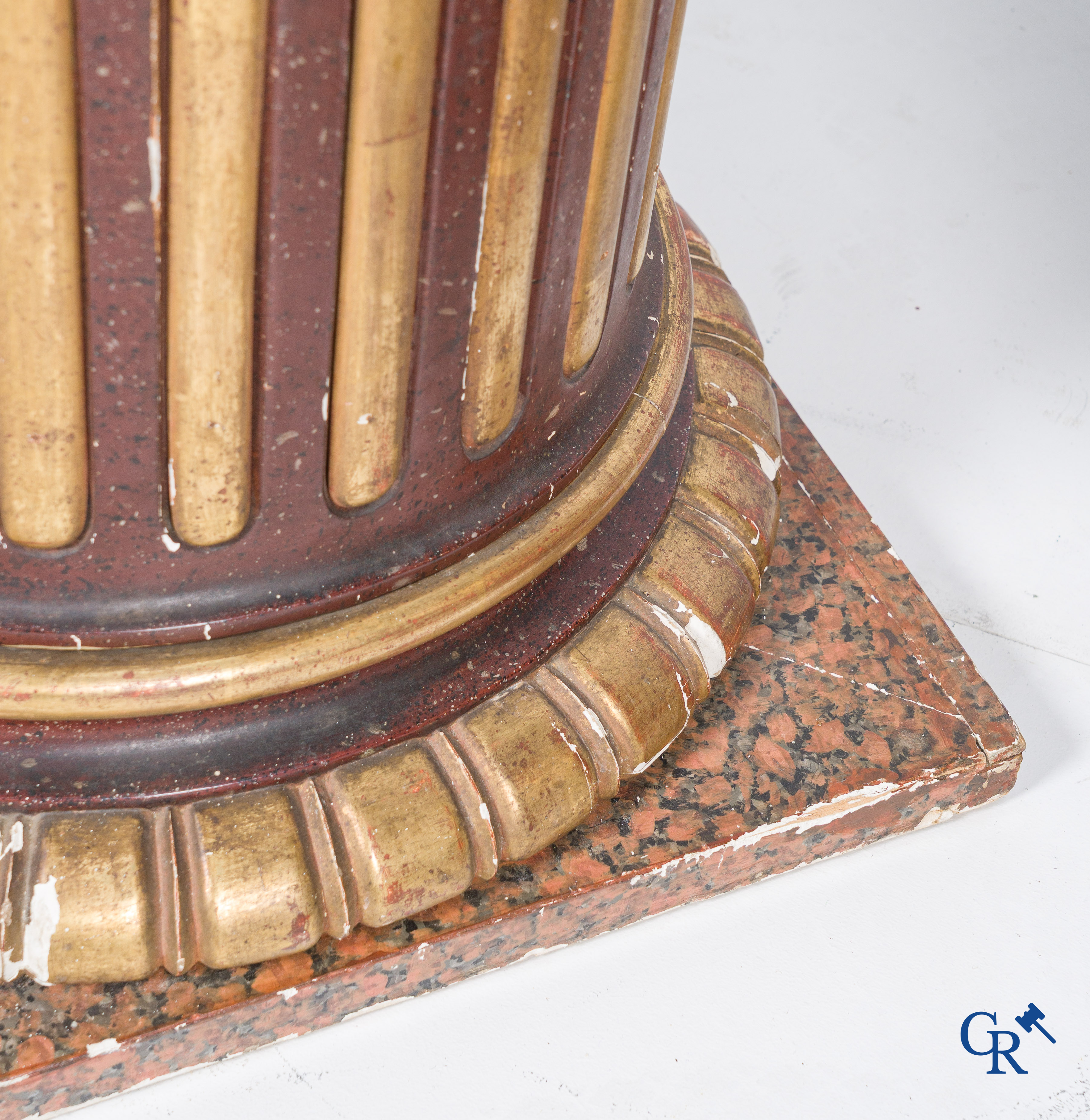 A pair of fluted, patinated and gilded wood sculpted columns. 19th century.