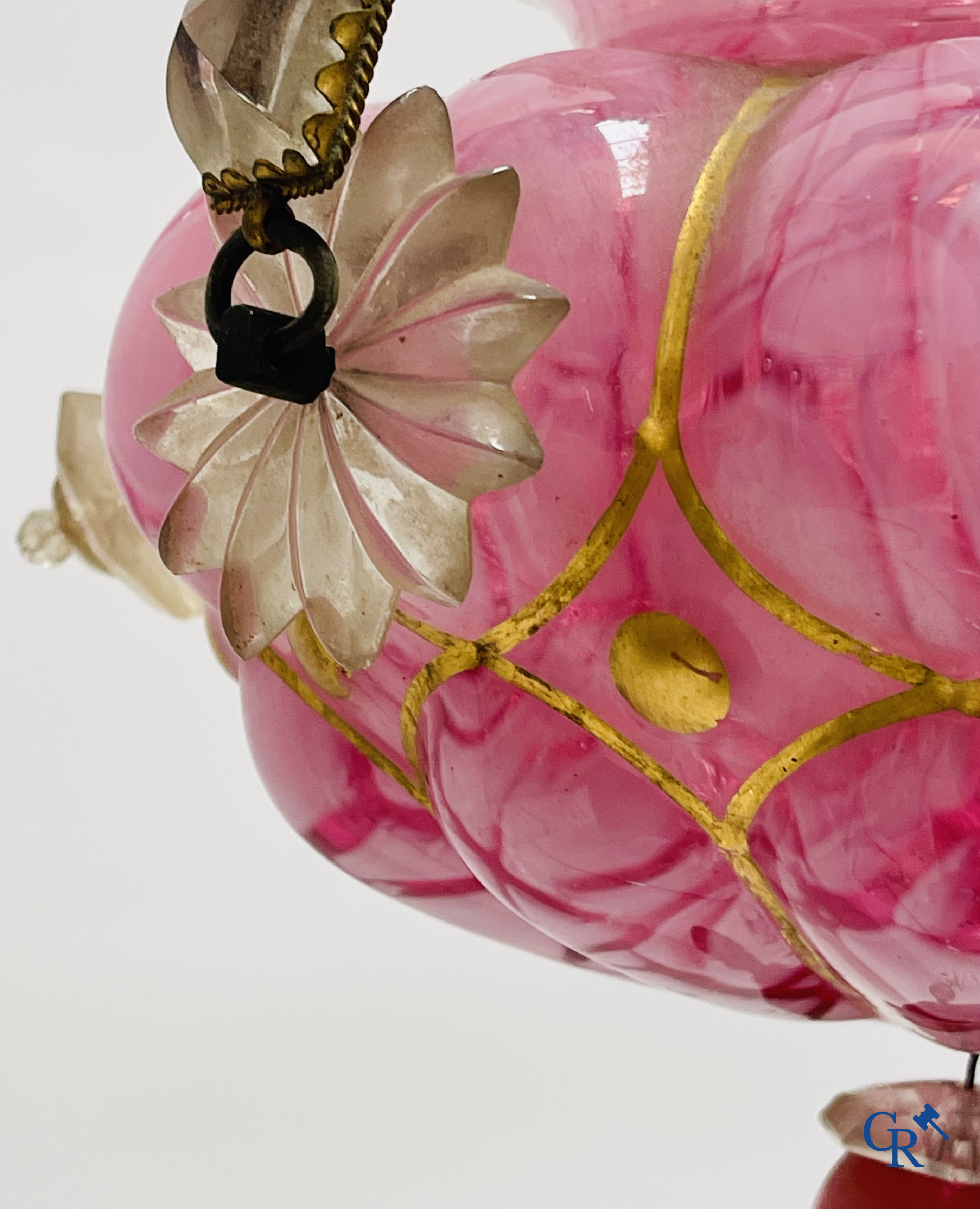 A chandelier in pink opaline and gilded frames with mounted crystal in the style of Baccarat. Circa 1860.