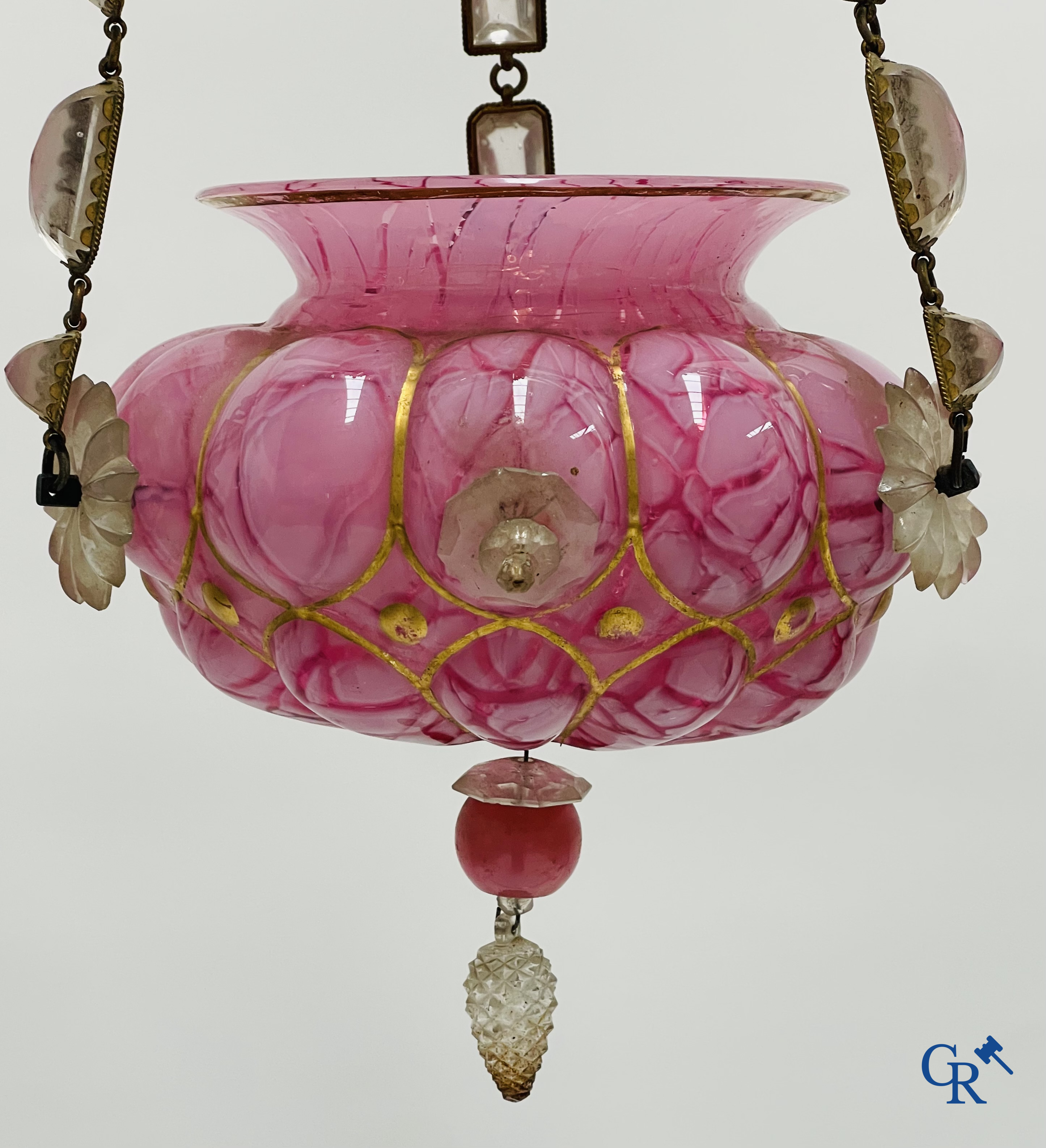A chandelier in pink opaline and gilded frames with mounted crystal in the style of Baccarat. Circa 1860.