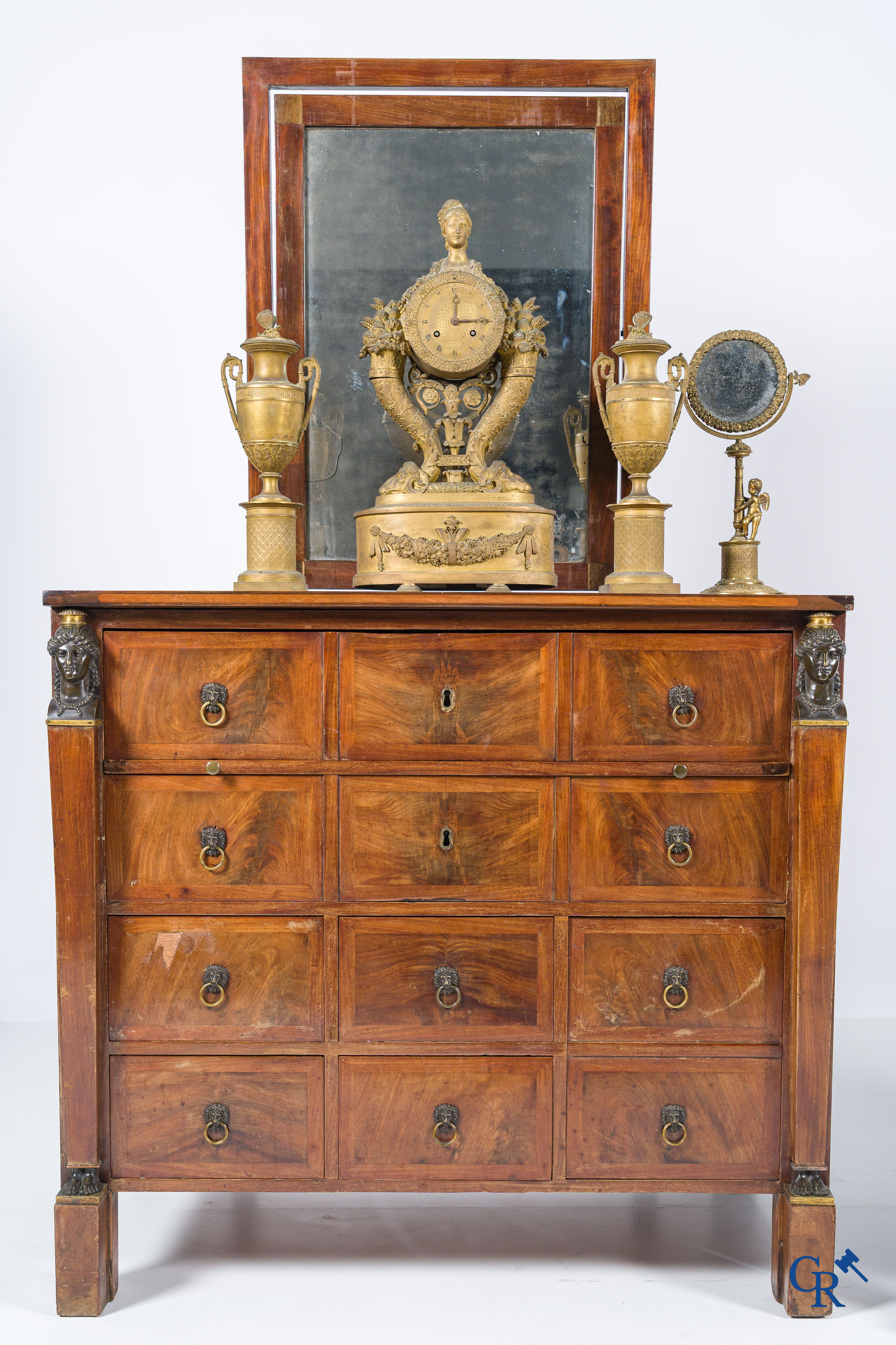 Chapuis, a mahogany wooden men's dressing table and ladies' dressing table with chiseled bronzes. Empire, circa 1810.