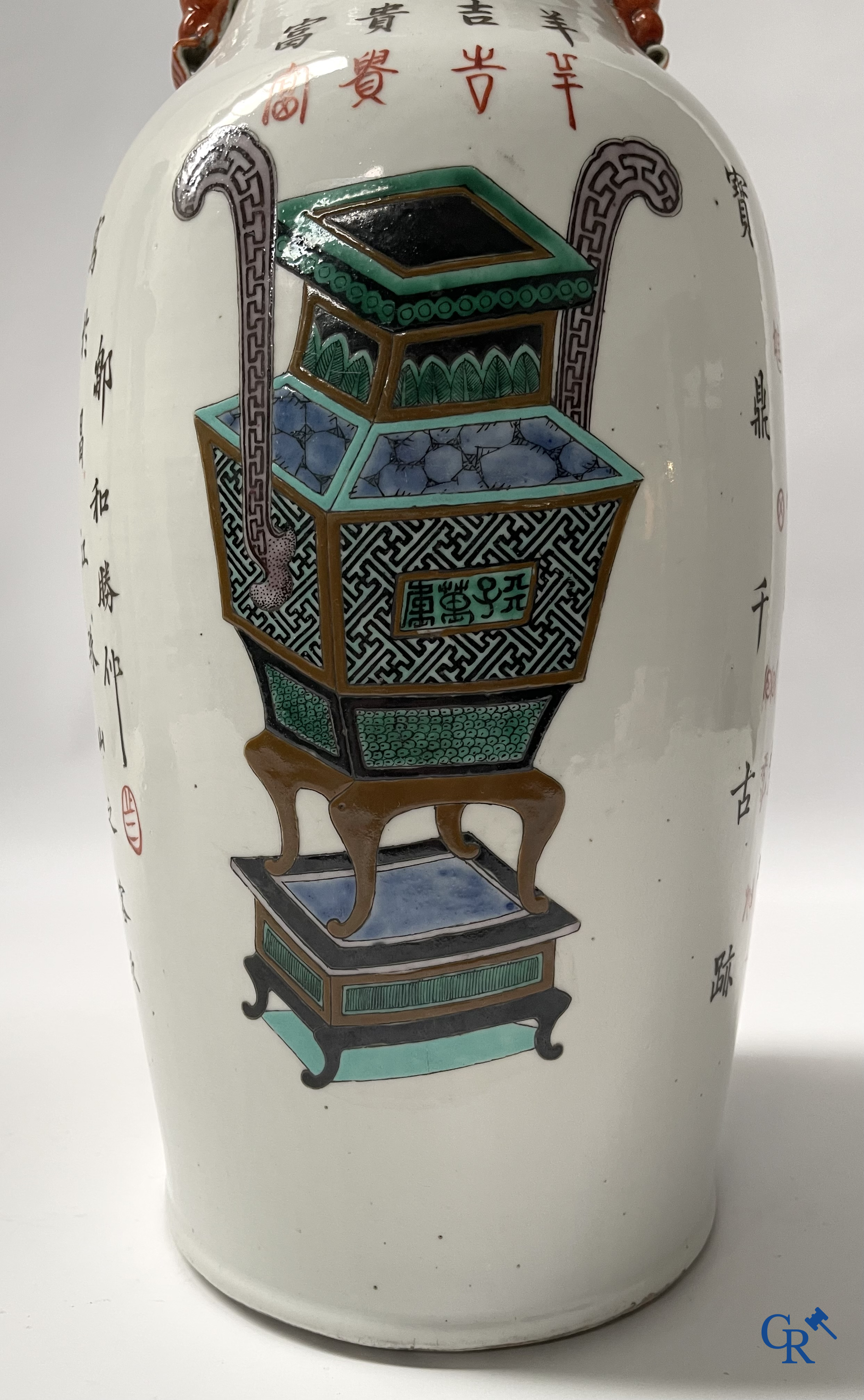 Asian Art, 2 Chinese famille rose vases decorated with antiques and a calligraphic text. 19th century.
