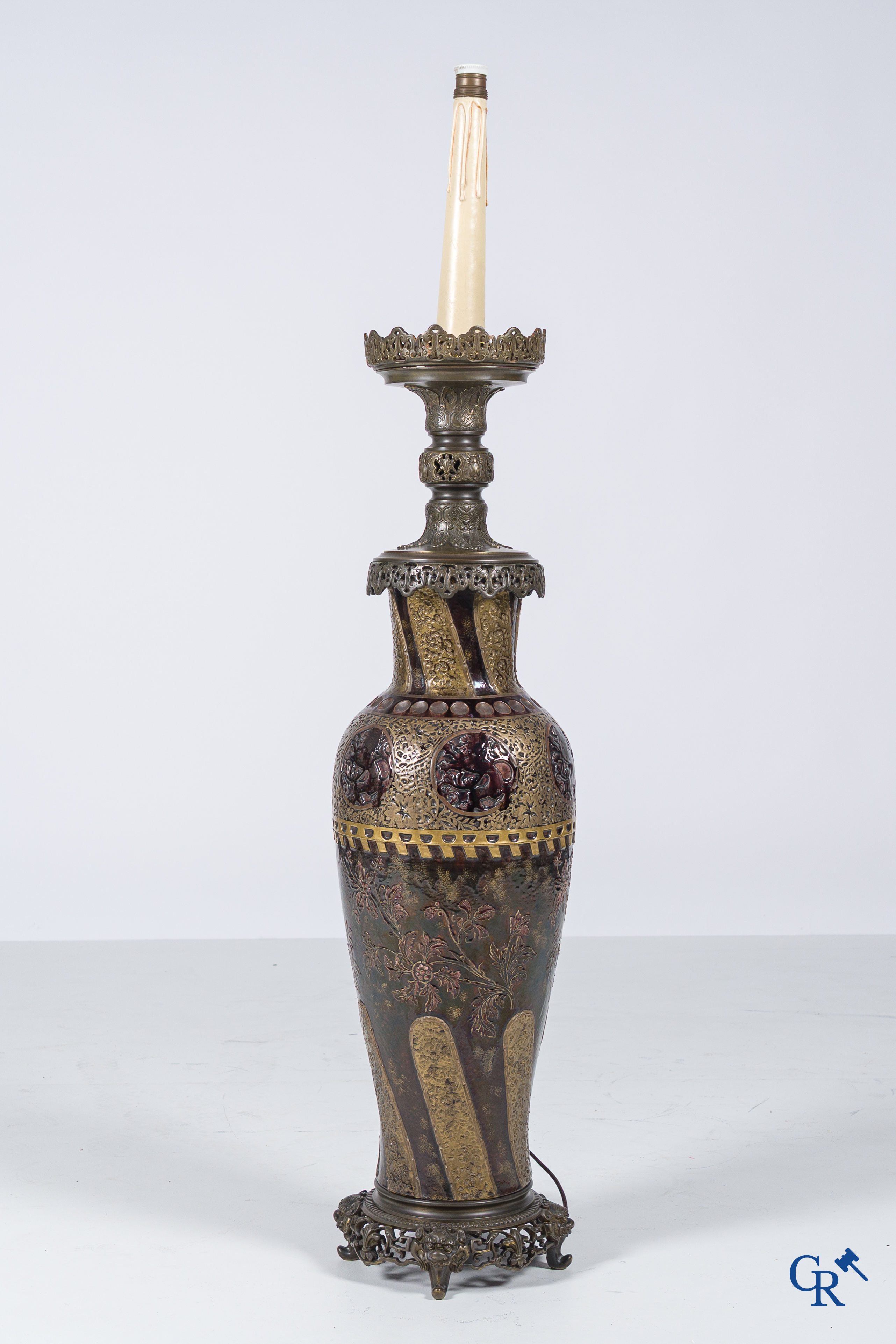 An imposing vase in French faience with bronze frames in Japonizing style mounted as a lamp. Circa 1890.