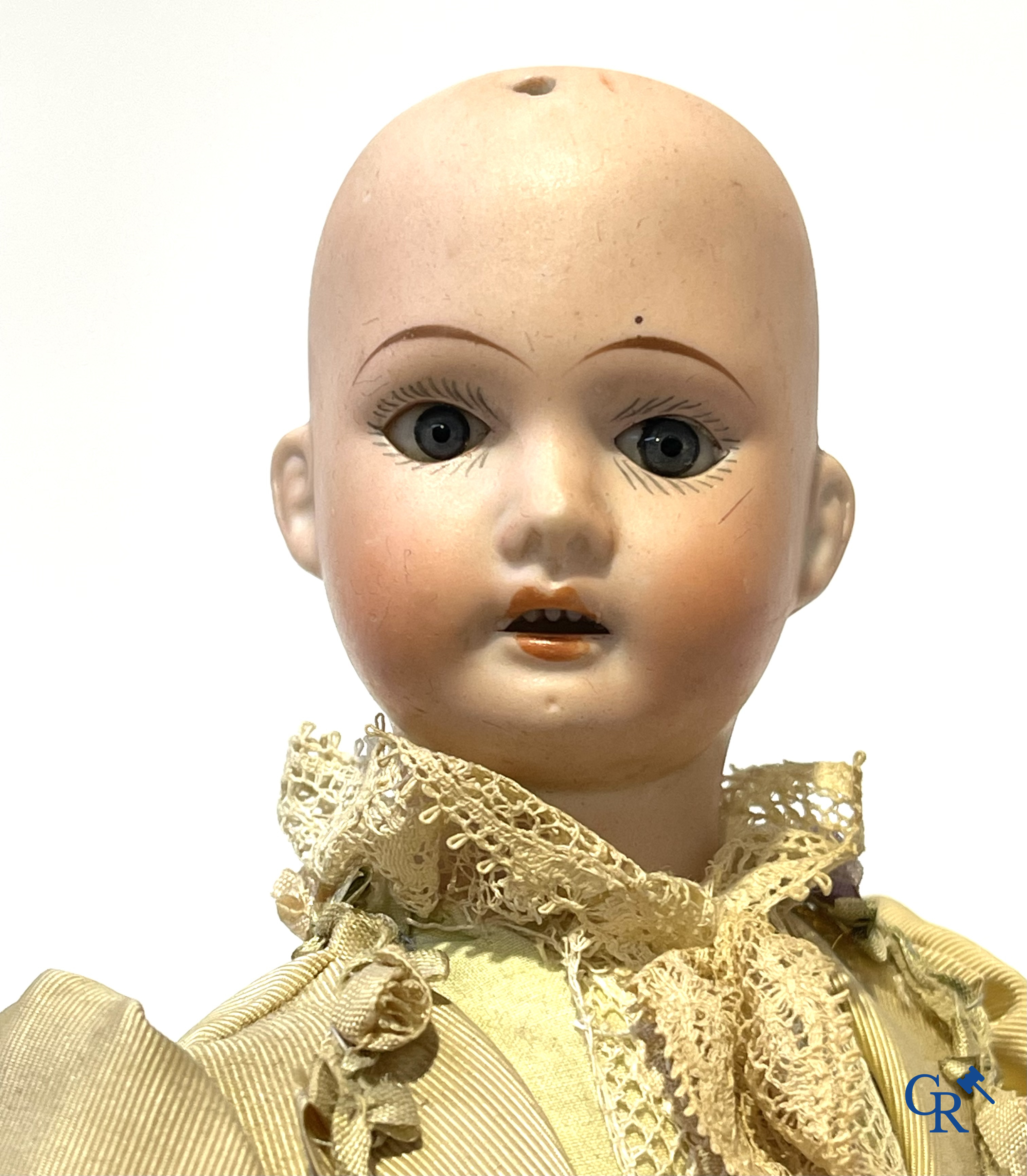 Old toys, 2 antique dolls with porcelain head and an automaton with music. Marked.